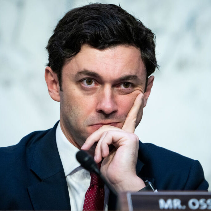 Sen. Jon Ossoff, D-Ga., listens to Peiter Mudge Zatko, former head of security at Twitter, testify in 2022.