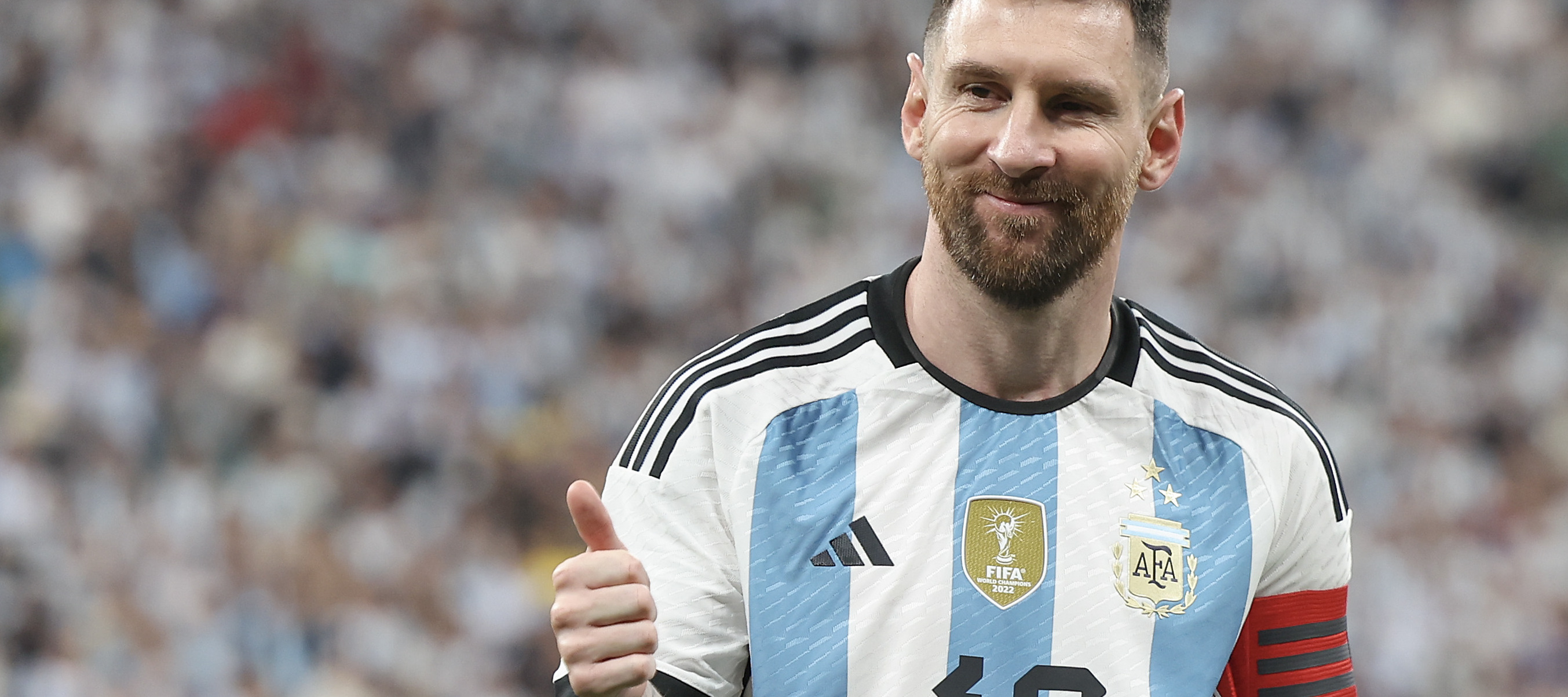 Lionel Messi gives the thumbs up at an Argentina match.