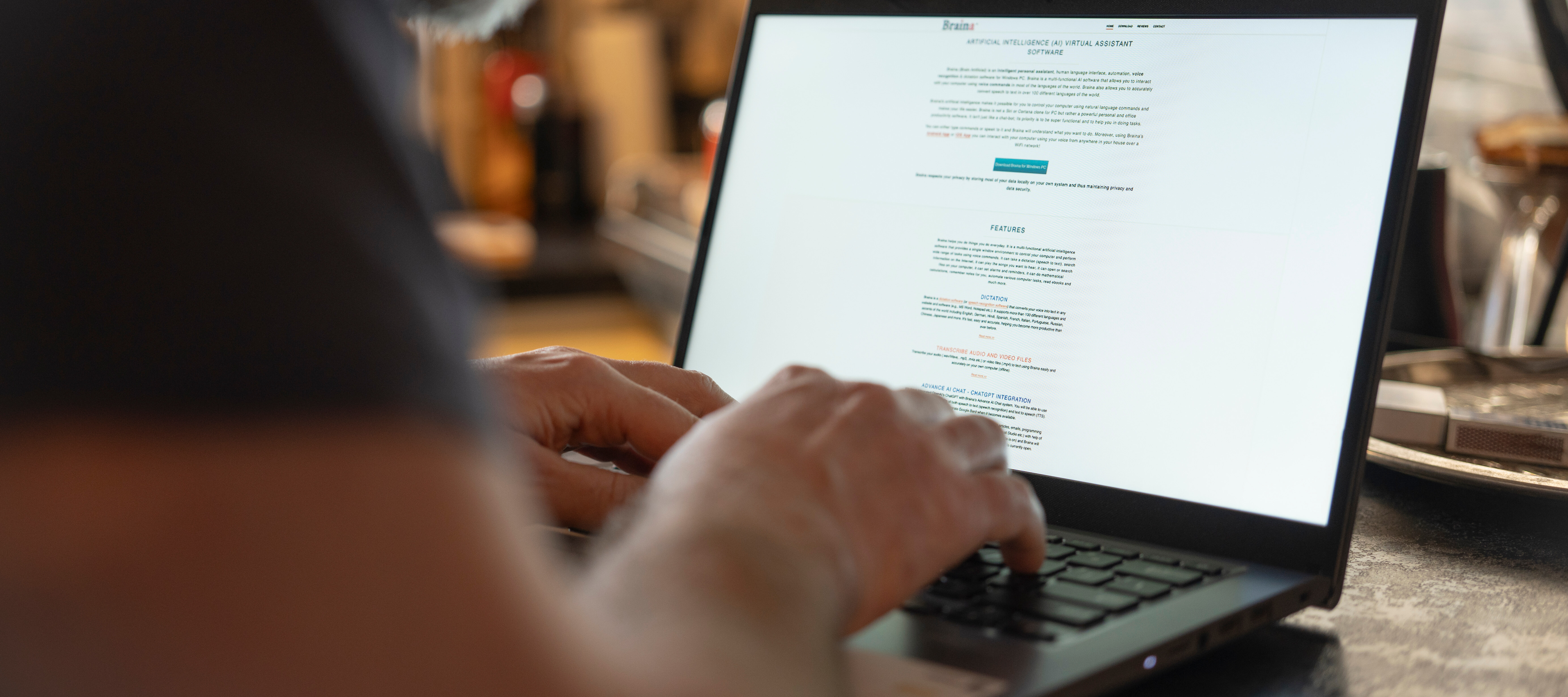 A man chats with a chatbot on his computer.