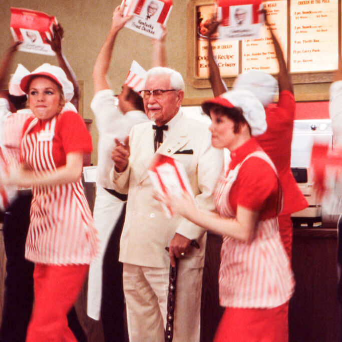 Photo of Colonel Sanders with KFC workers