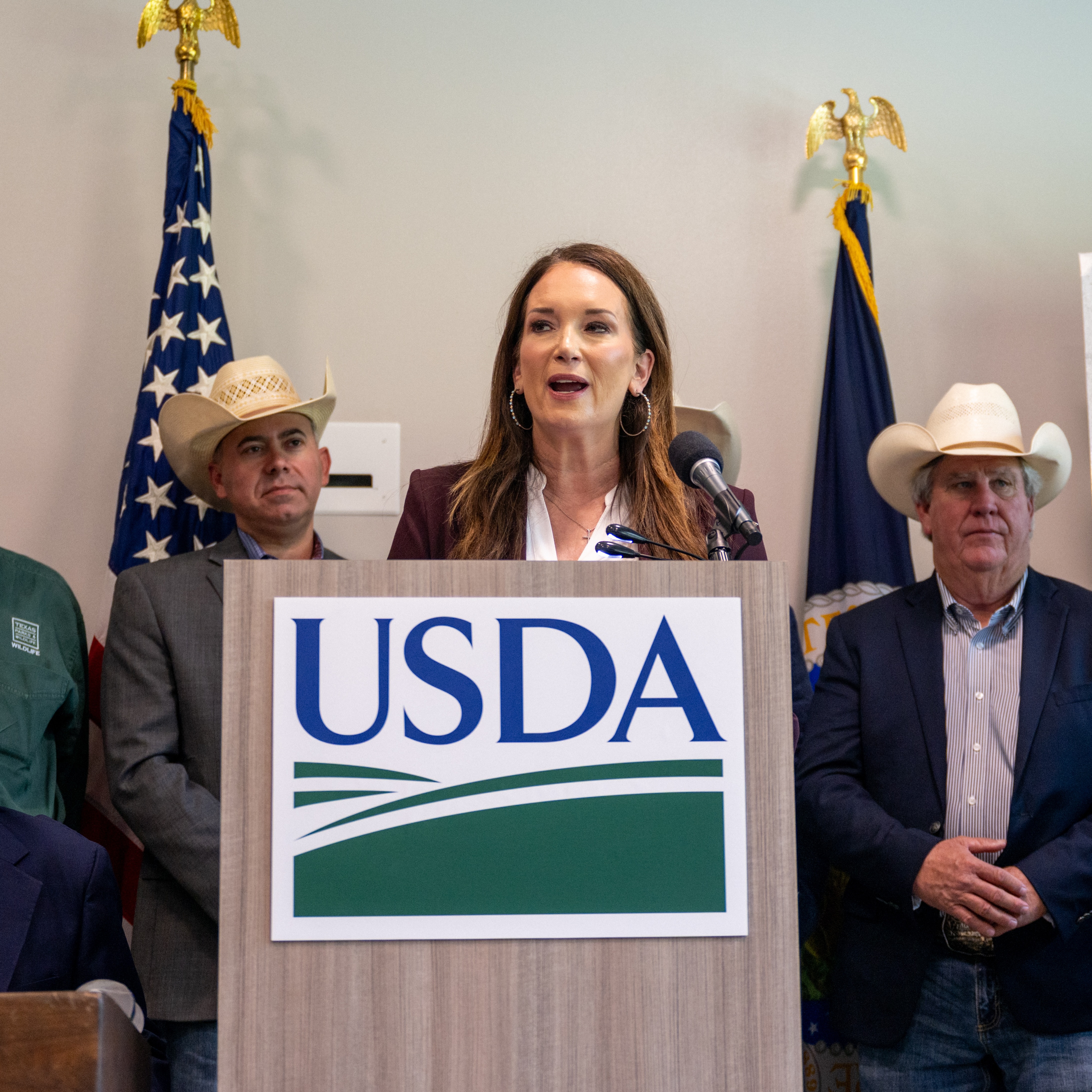 Agriculture Secretary Brooke Rollins speaks alongside Gov. Greg Abbott, ranchers, and health officials during a press conference about New World screwworm.