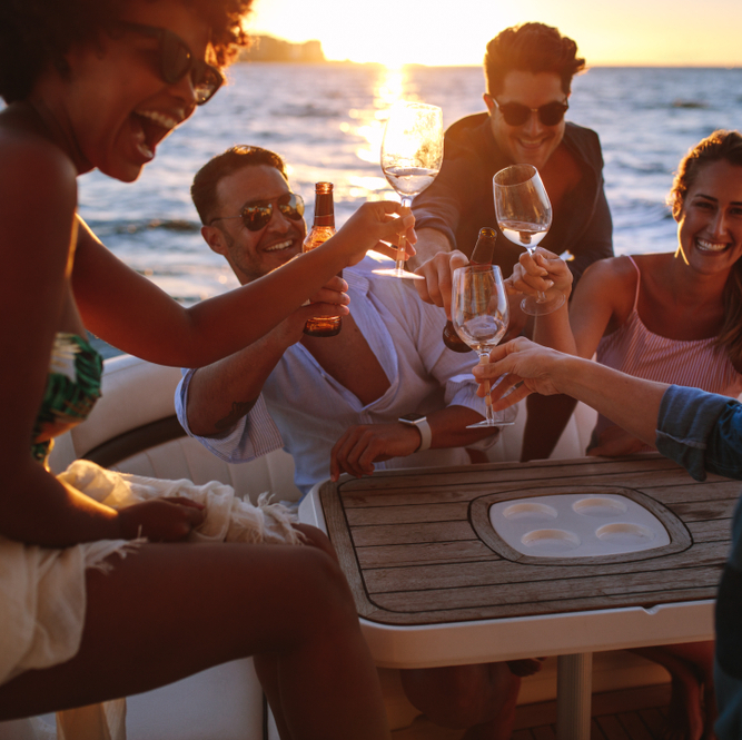 Photo of people partying on a yacht.