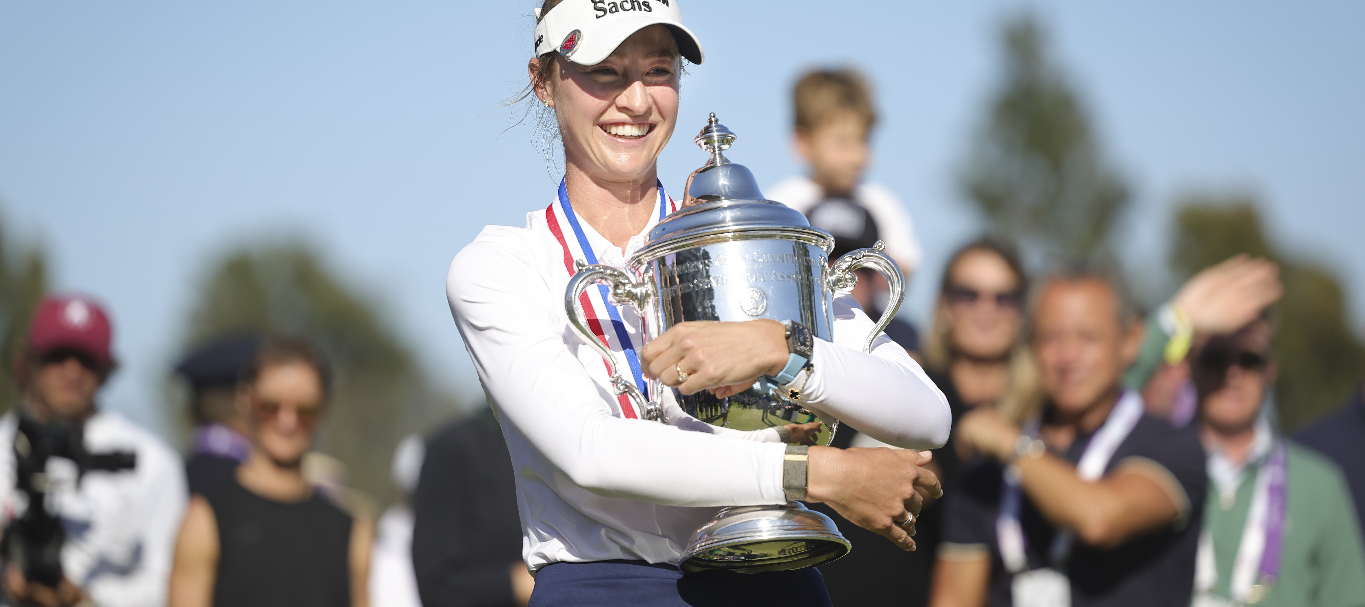 Nelly Korda hugs the Harton S. Semple Trophy after winning the U.S. Women's Open.