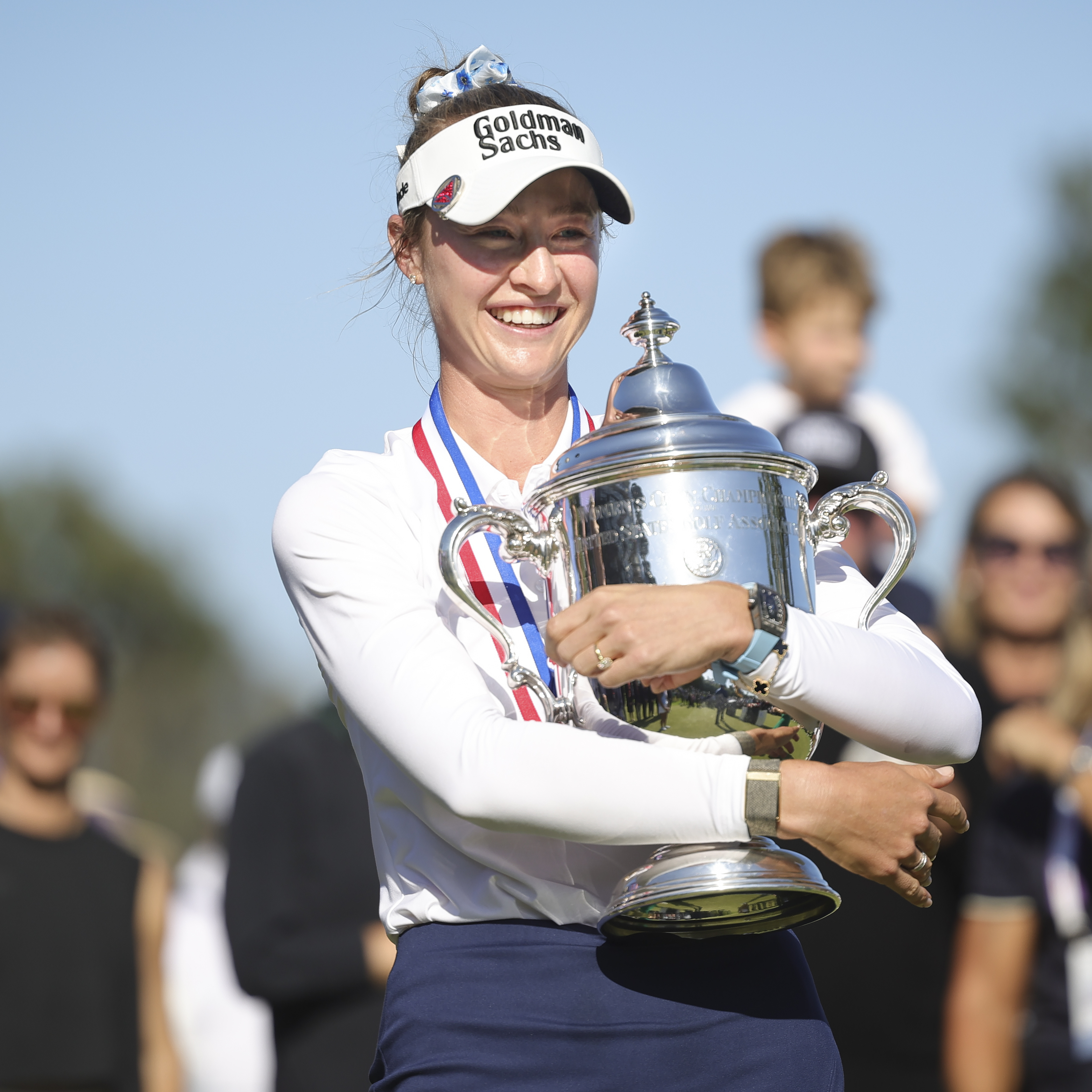Nelly Korda hugs the Harton S. Semple Trophy after winning the U.S. Women's Open.