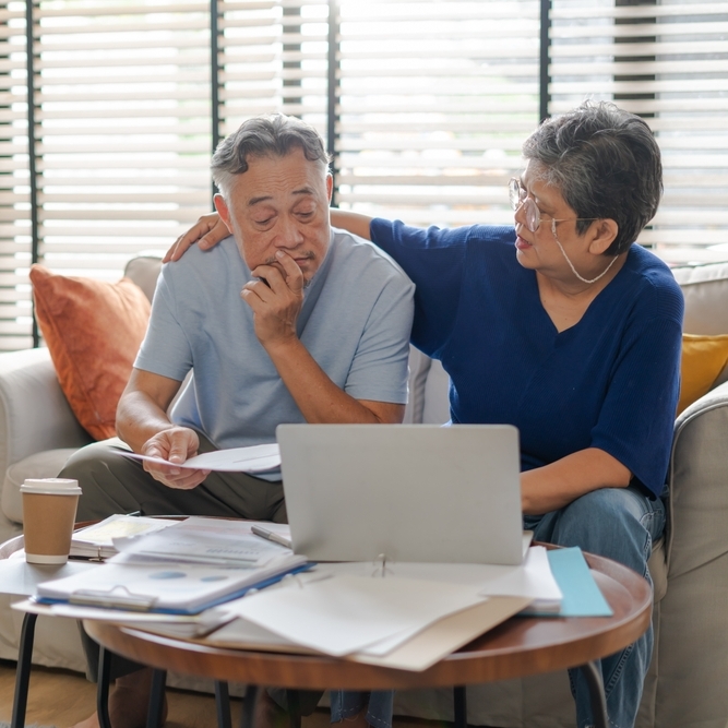Older couple reviewing paperwork