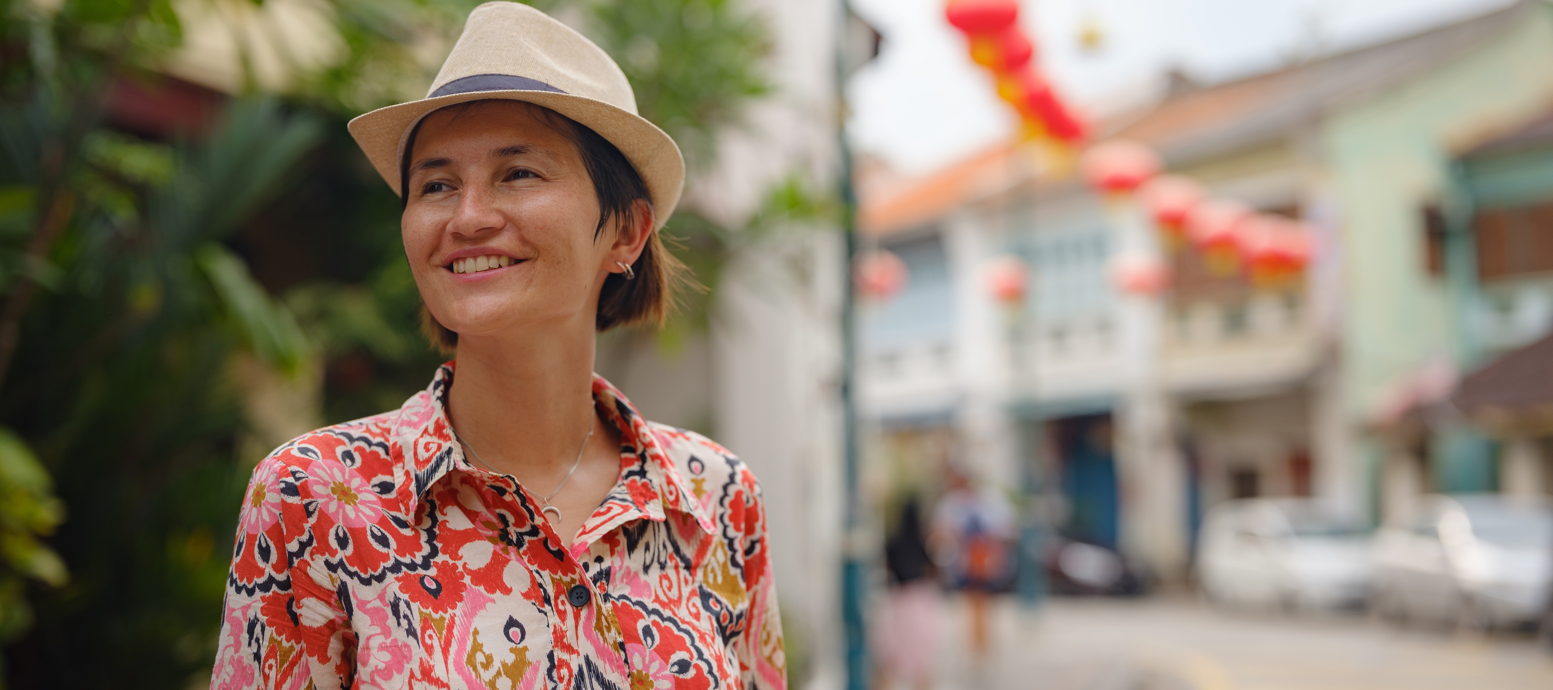 woman exploring colourful city