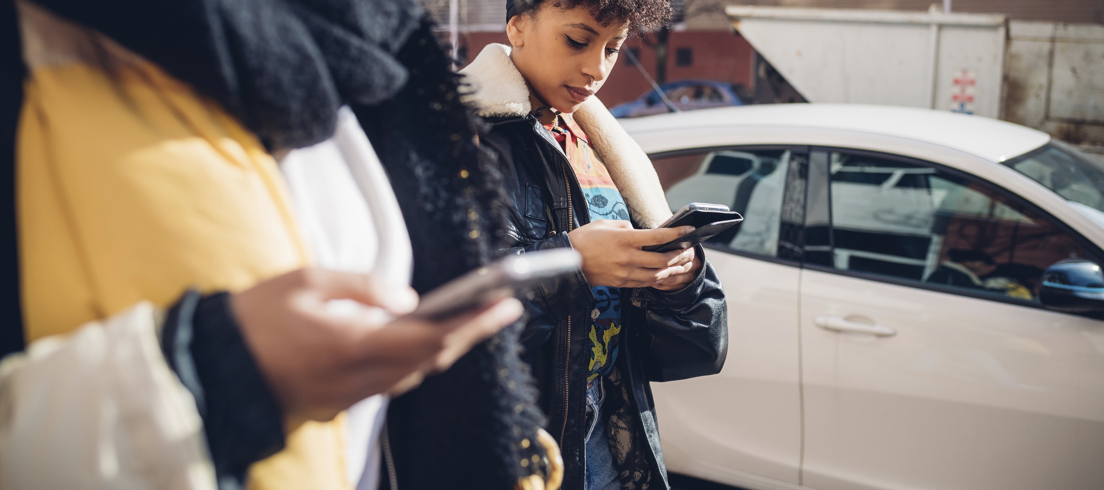 two women on phones