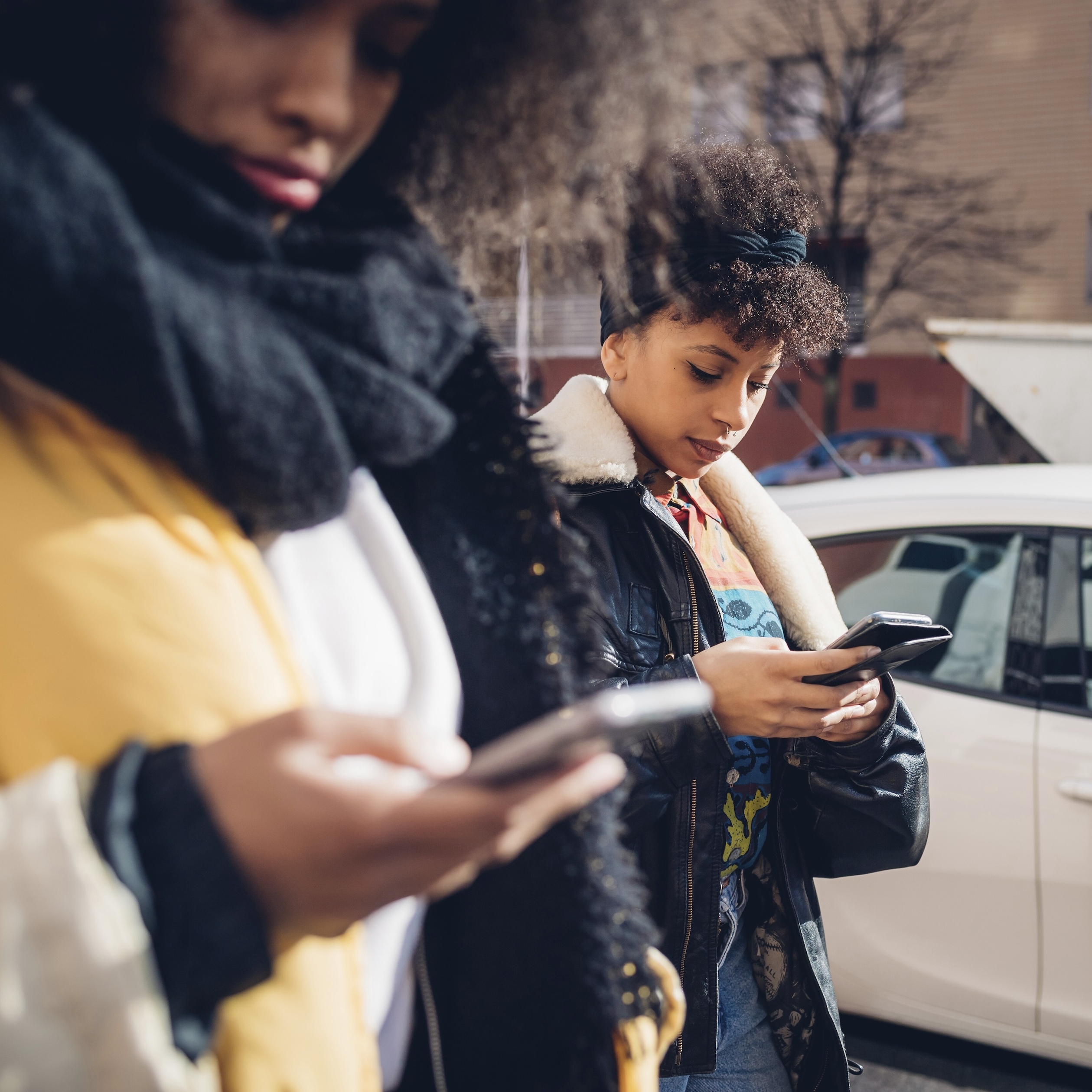 two women on phones