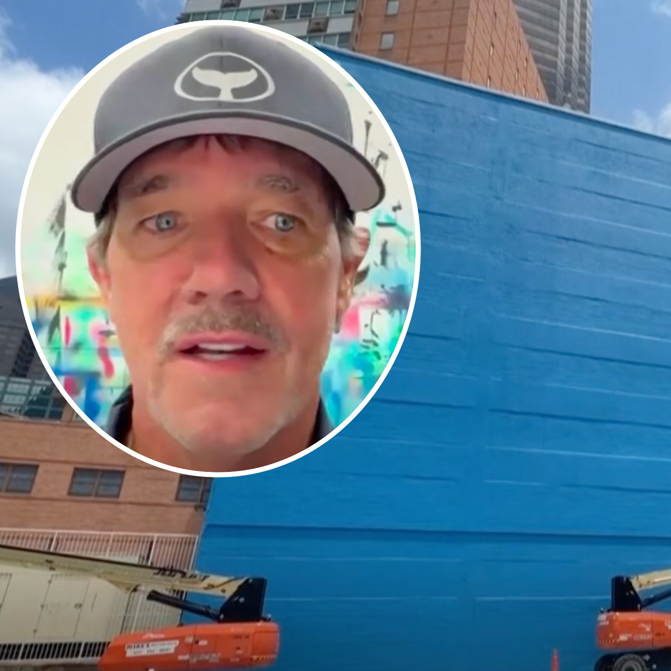 Artist Wyland, inset, talks about his "Whaling Wall" mural being painted over.