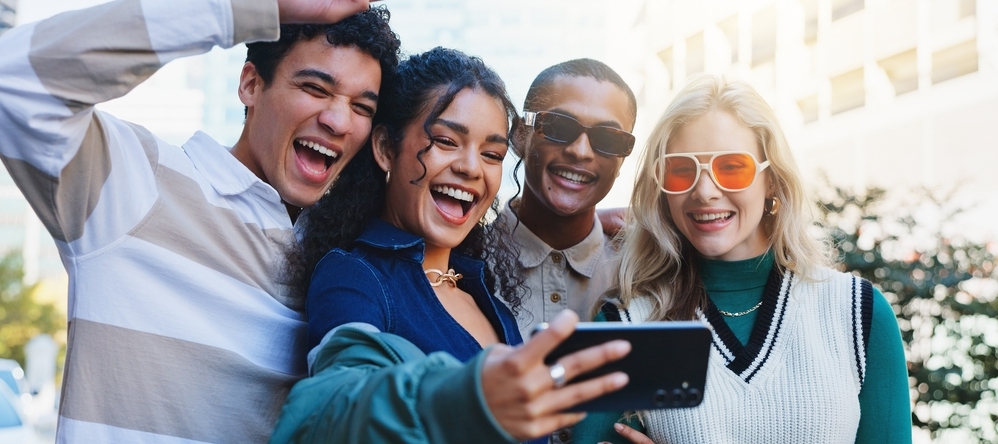 A group of friends taking a picture.