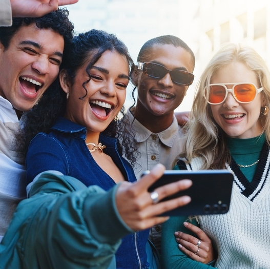 A group of friends taking a picture.