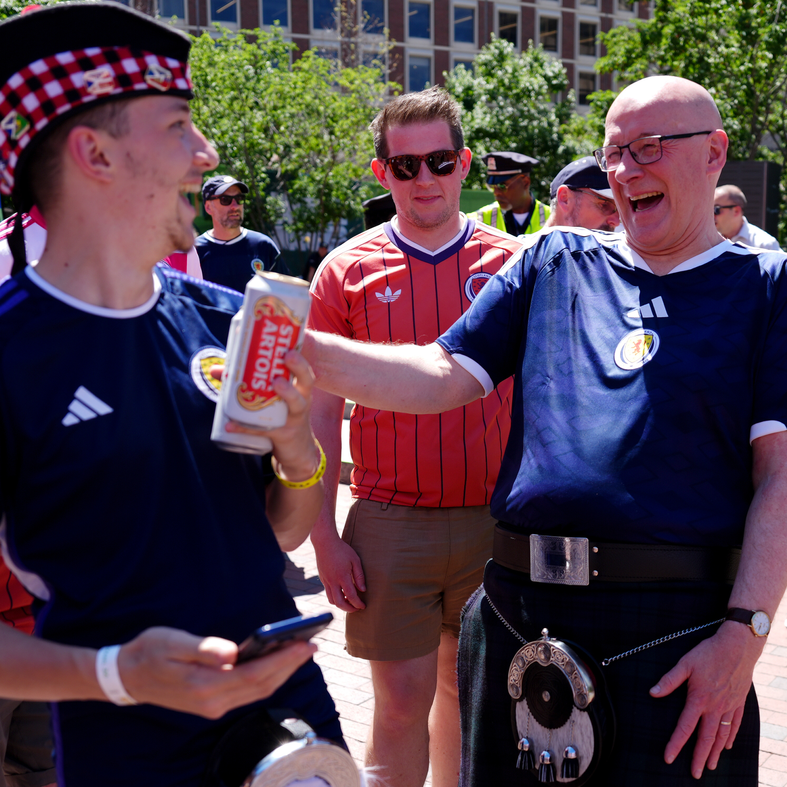 Scottish First Minister John Swinney (right) with Scotland fans at the FIFA Fan Festival ahead of the FIFA World Cup, Group C match between Haiti and Scotland.