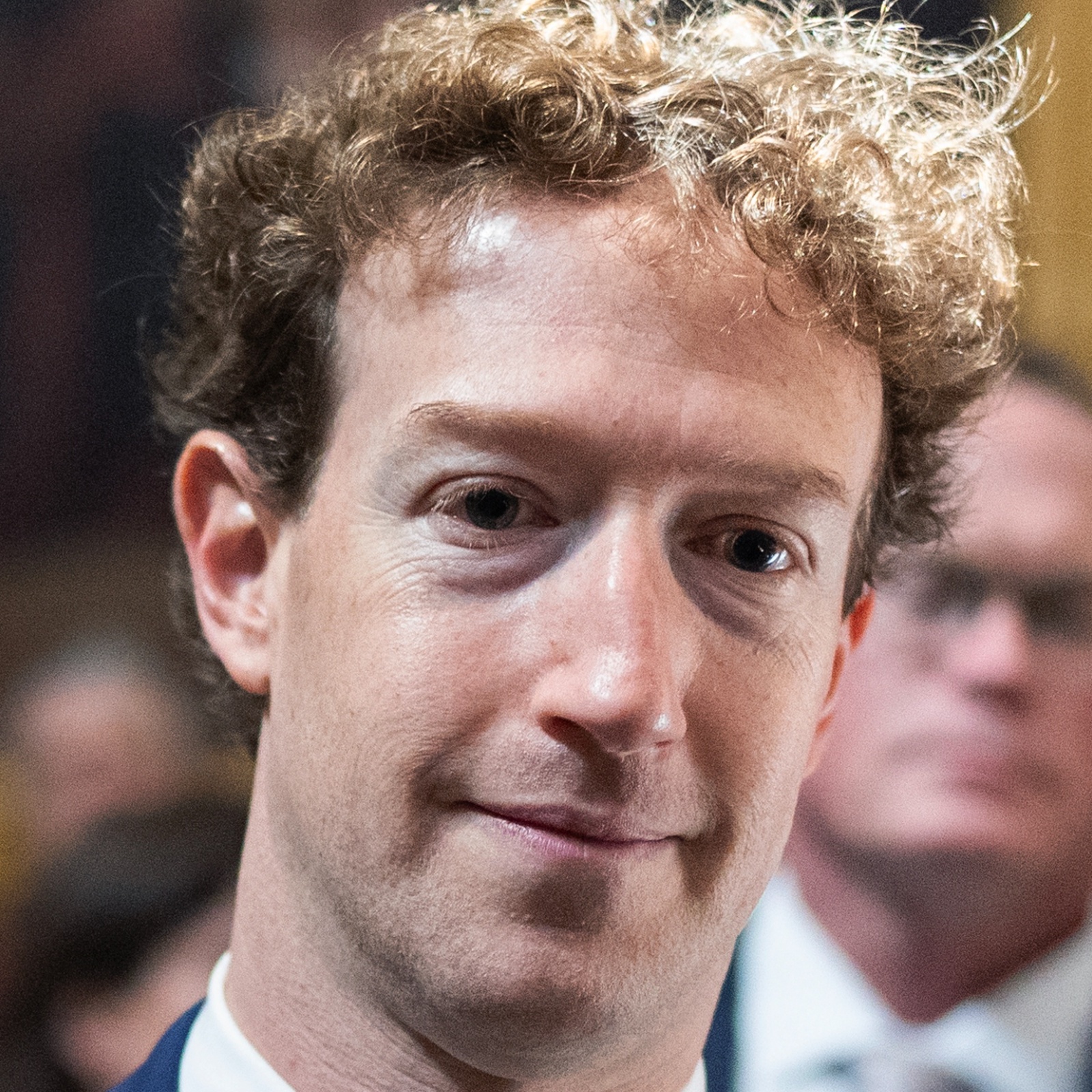Mark Zuckerberg looking shellshocked outside a courtroom