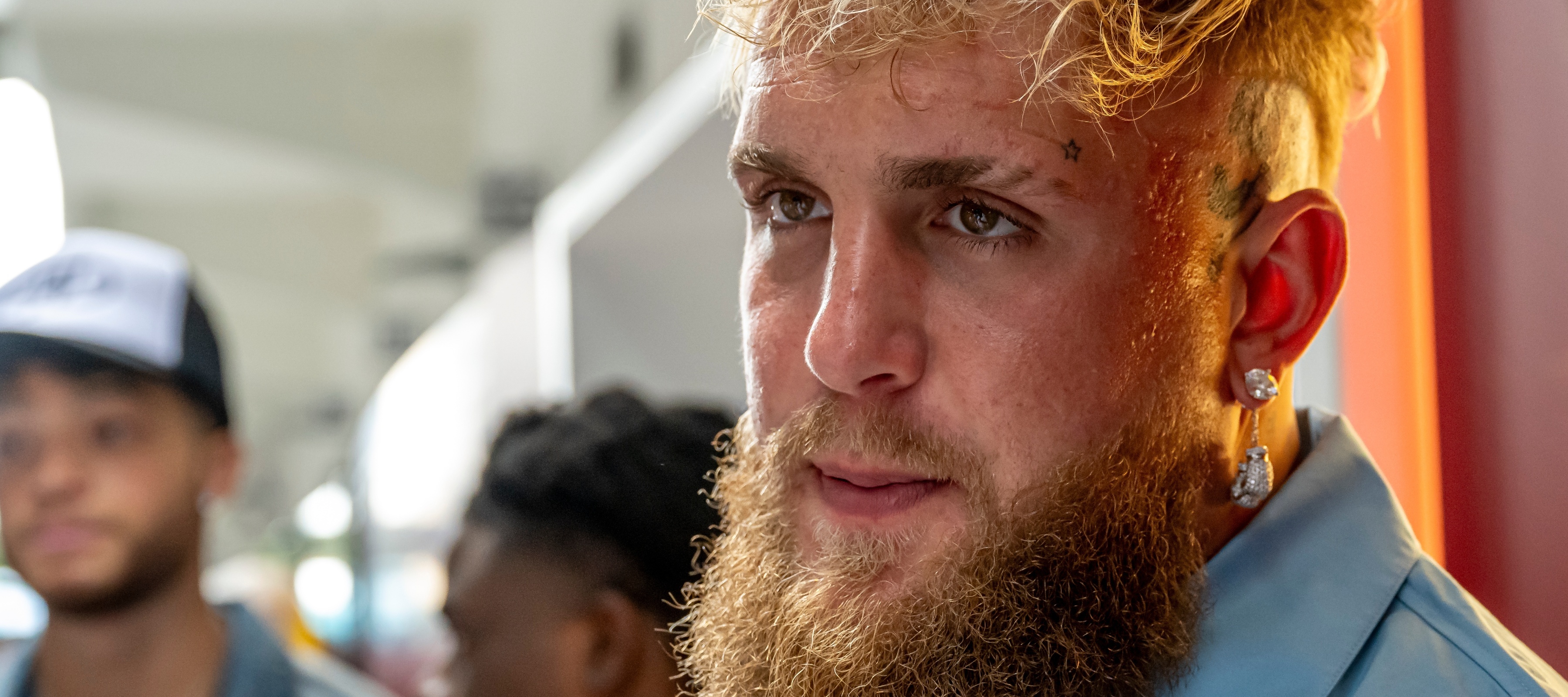 A close-up of Jake Paul's face