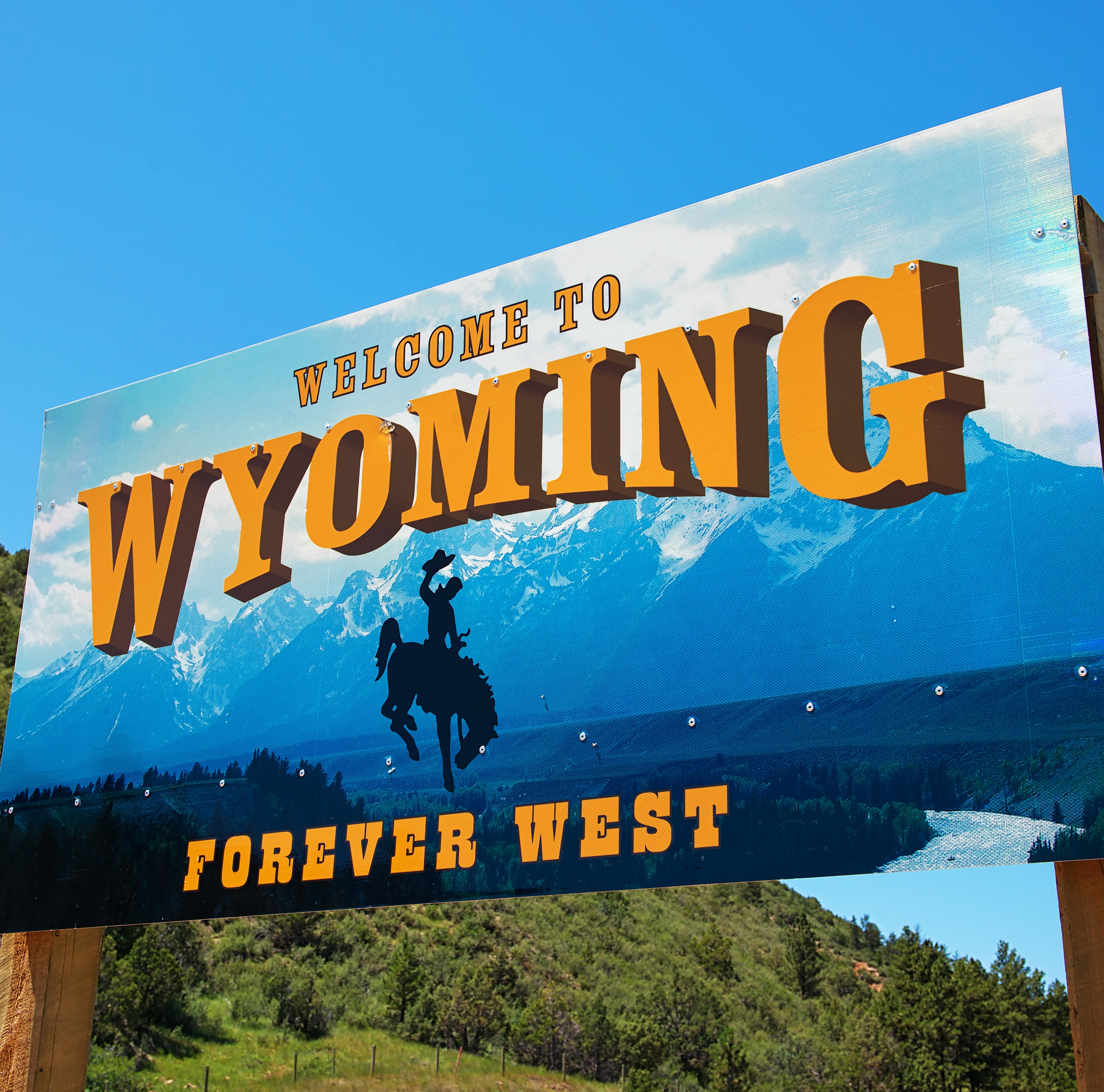 A sign welcoming visitors to the sparsely populated state of Wyoming, which wants to become a destination for blockchain companies.