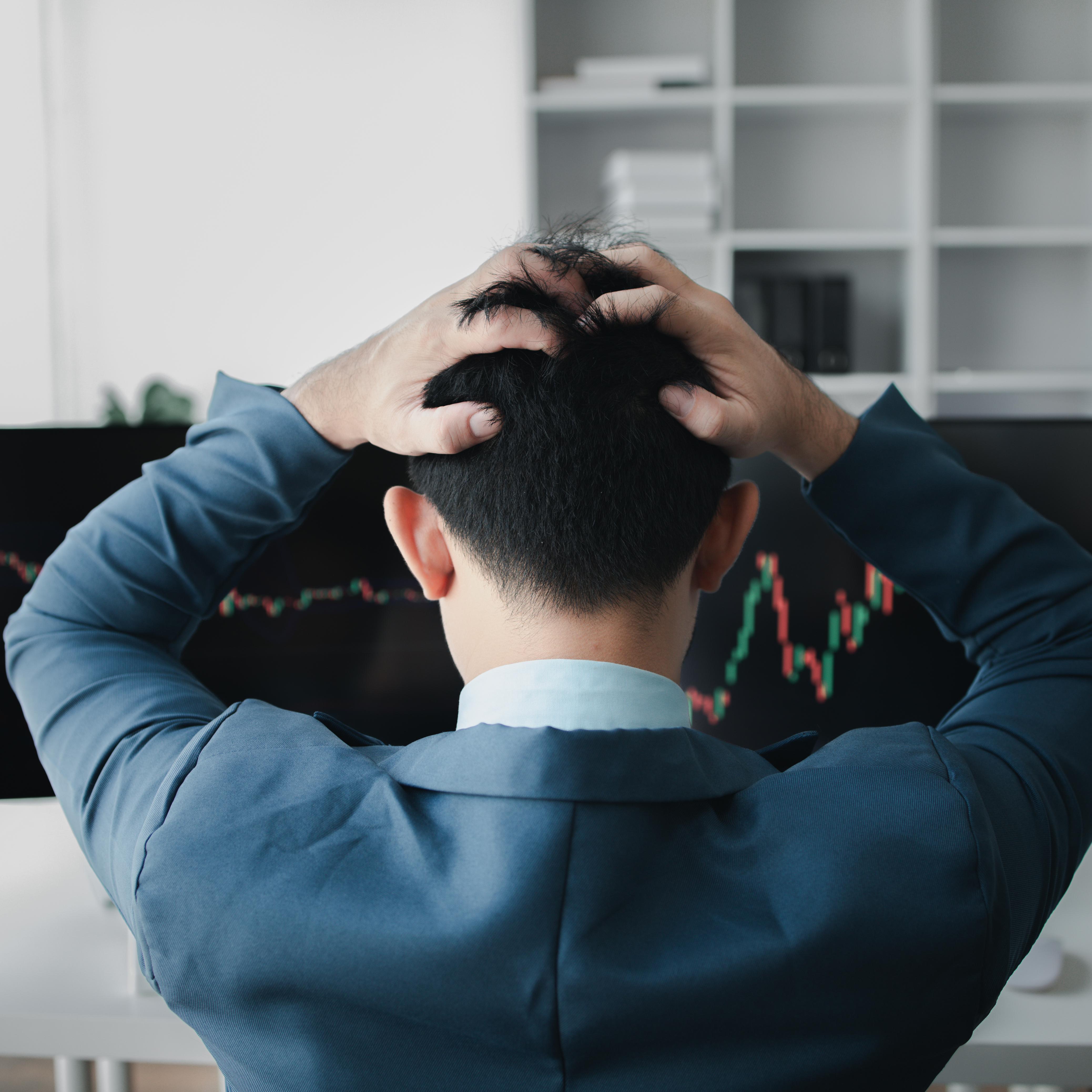 Frustrated man sitting at his computer