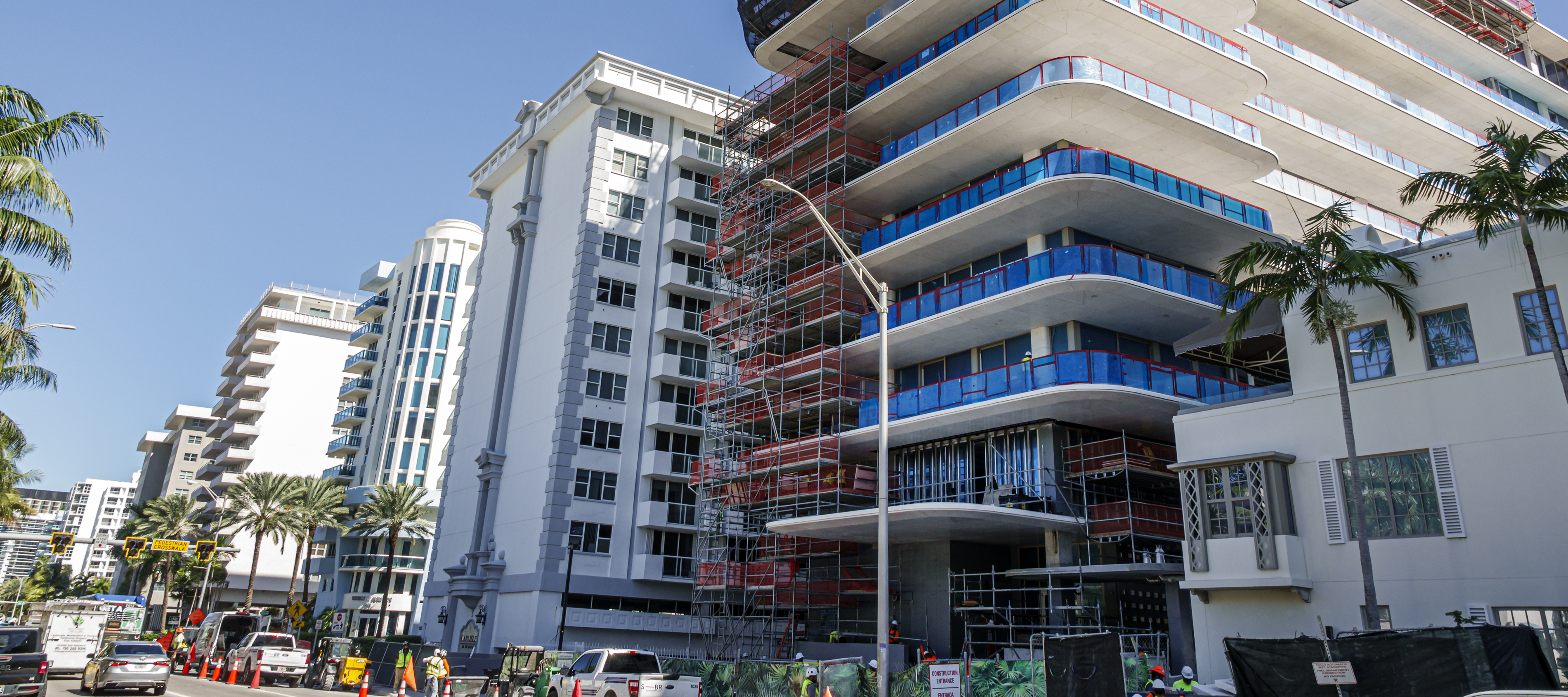 Exterior of high rise buildings with one under construction on Collins Avenue, Surfside, Florida.