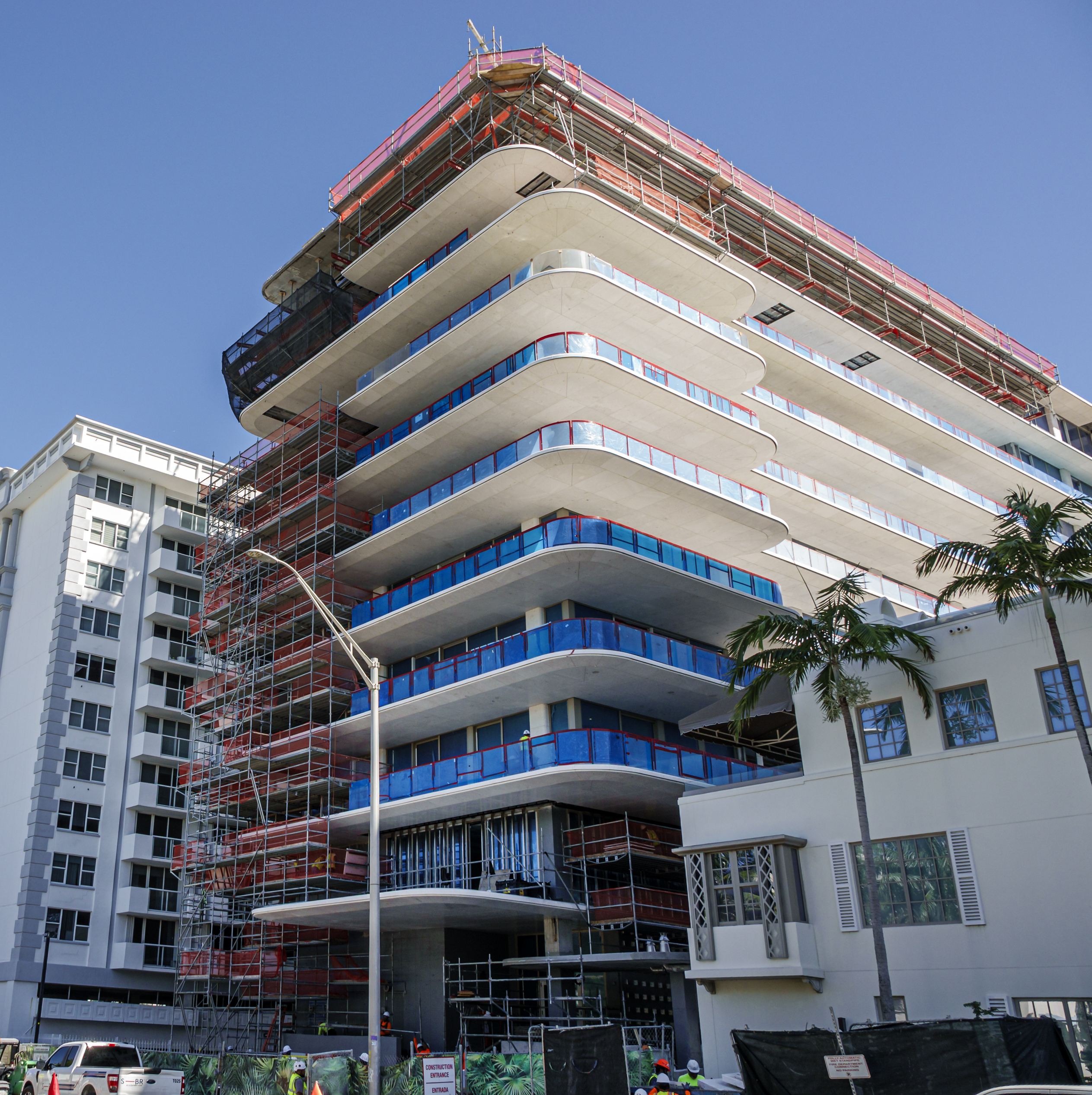 Exterior of high rise buildings with one under construction on Collins Avenue, Surfside, Florida.