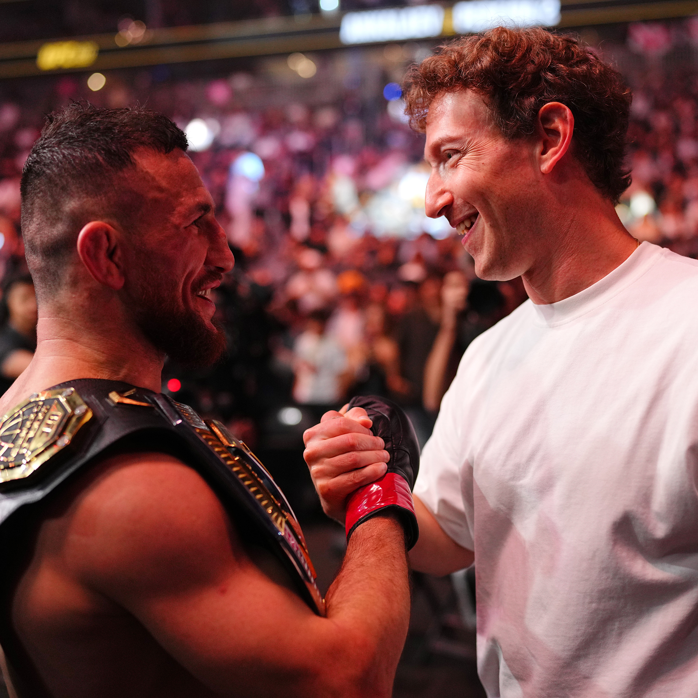 Mark Zuckerberg shakes hands with Merab Dvalishvili following his win in the UFC bantamweight championship fight during UFC 320.
