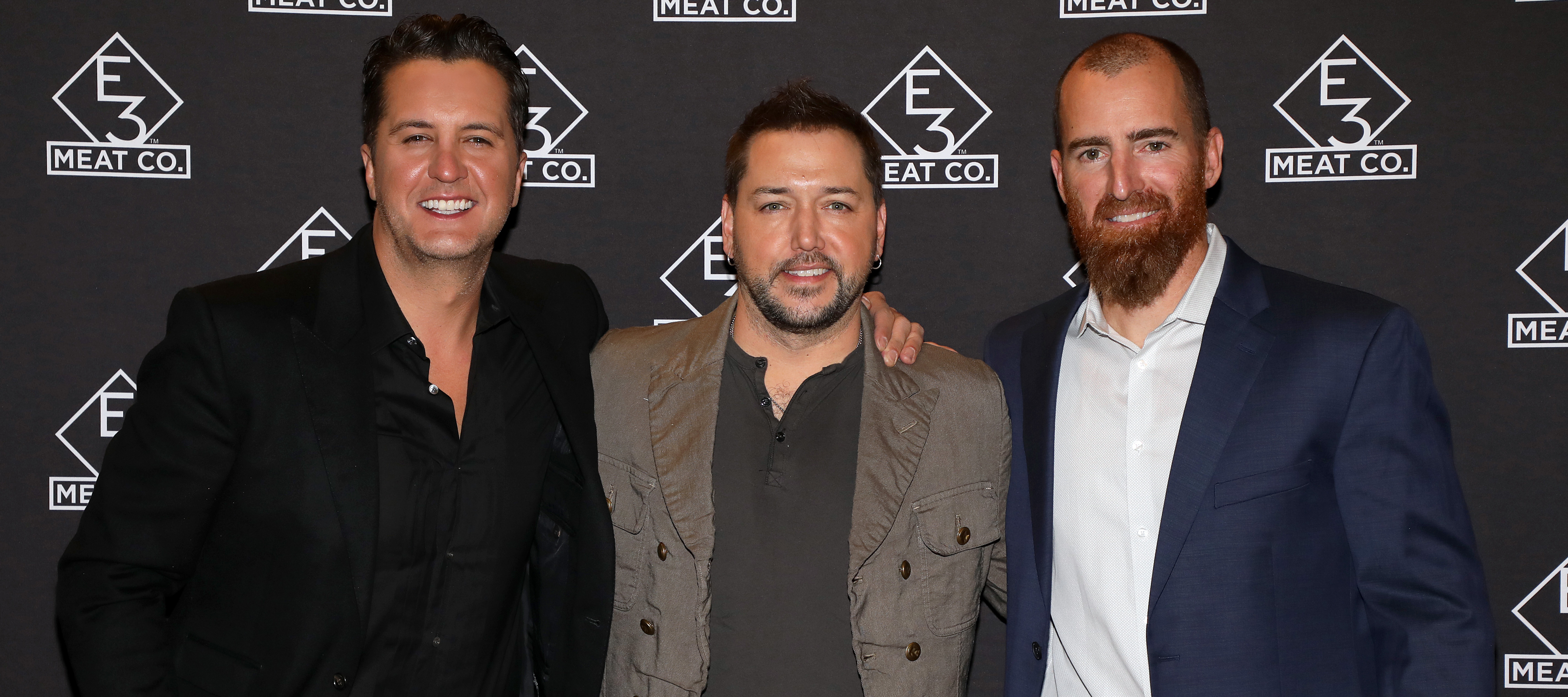 Luke Bryan, Jason Aldean and Adam LaRoche attend the grand opening of E3 Chophouse Nashville.