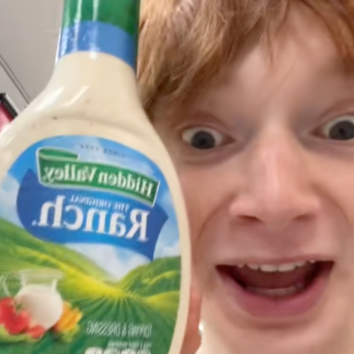 A side by side image of TikTok users @calumharper18 and @eloweese talking excitedly about ranch dressing in their social media posts.
