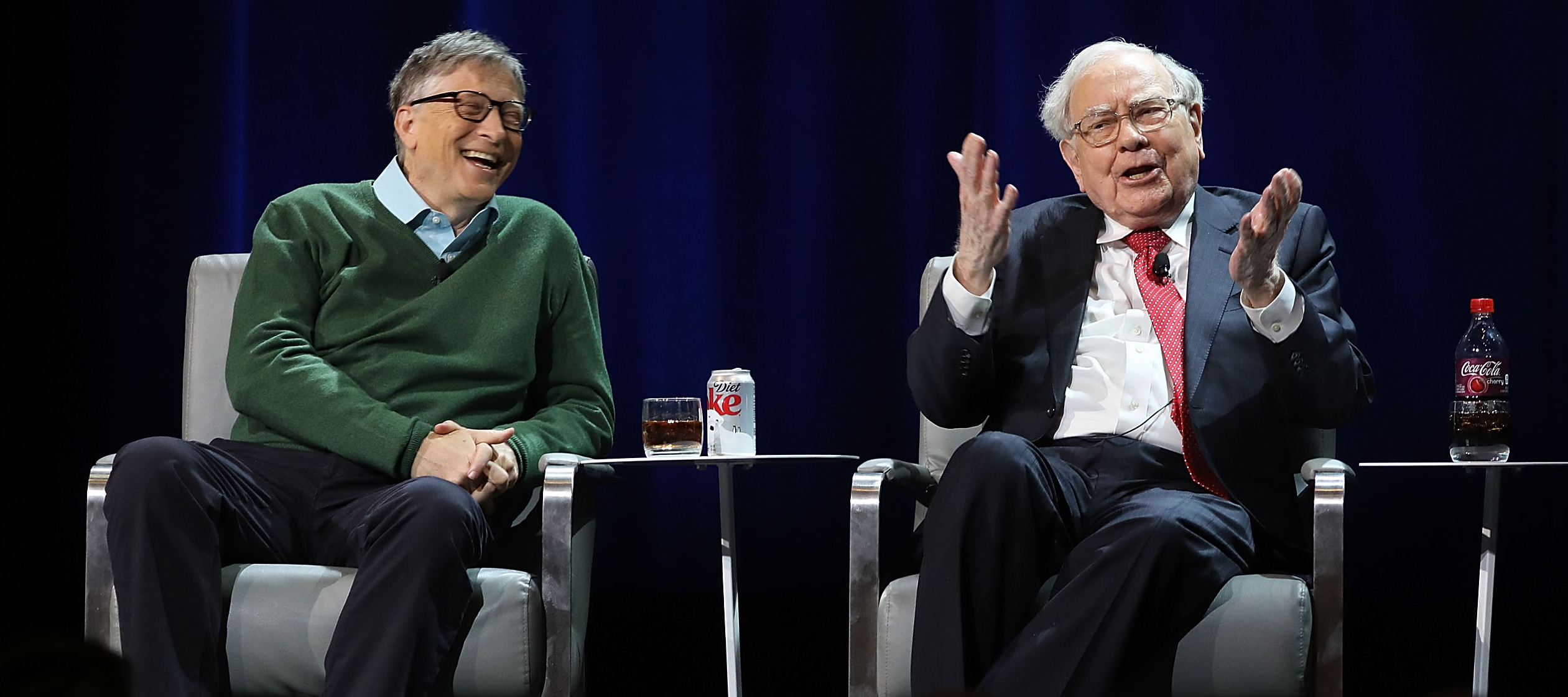 Bill Gates and Warren Buffett speak onstage together at an event organized by Columbia Business School.