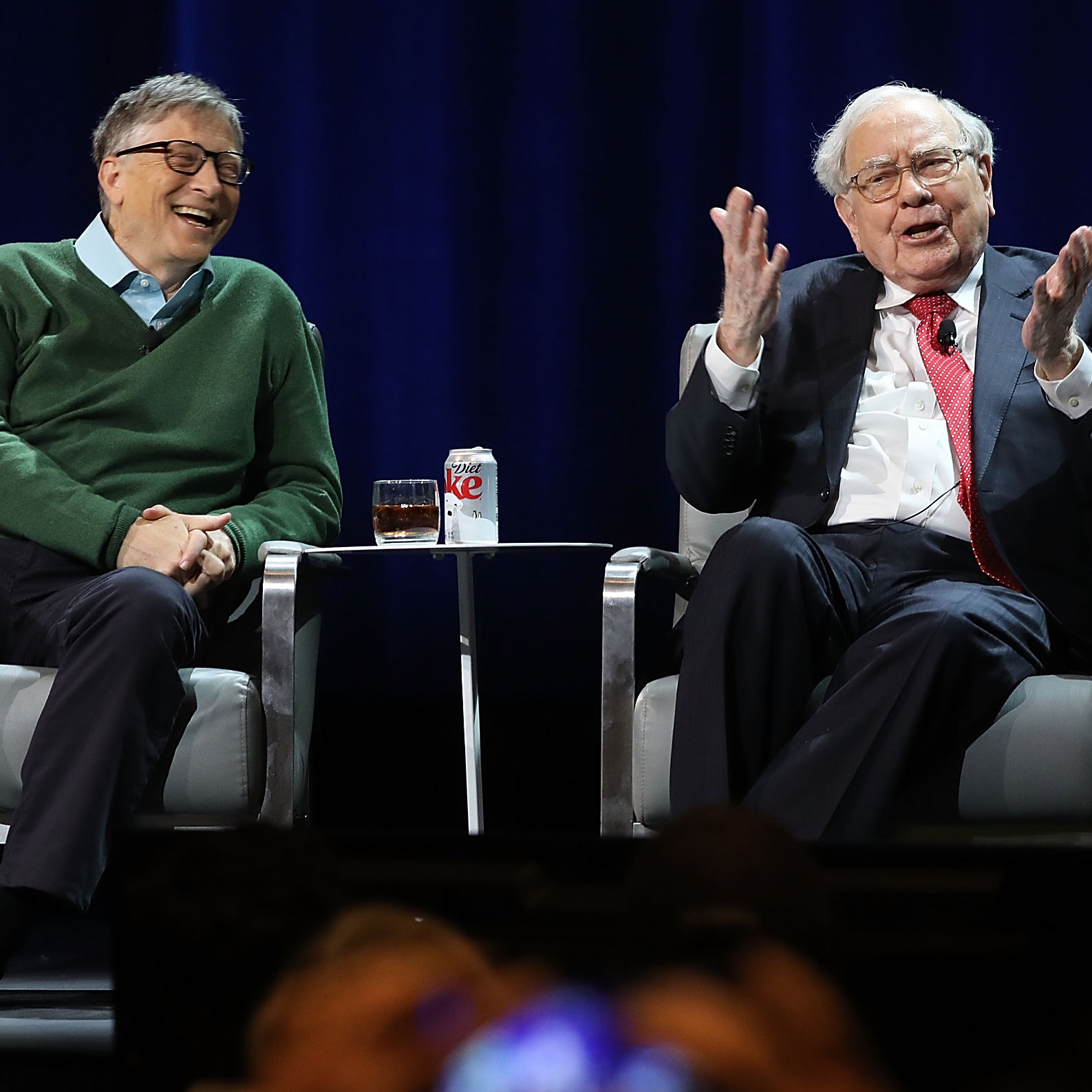 Bill Gates and Warren Buffett speak onstage together at an event organized by Columbia Business School.