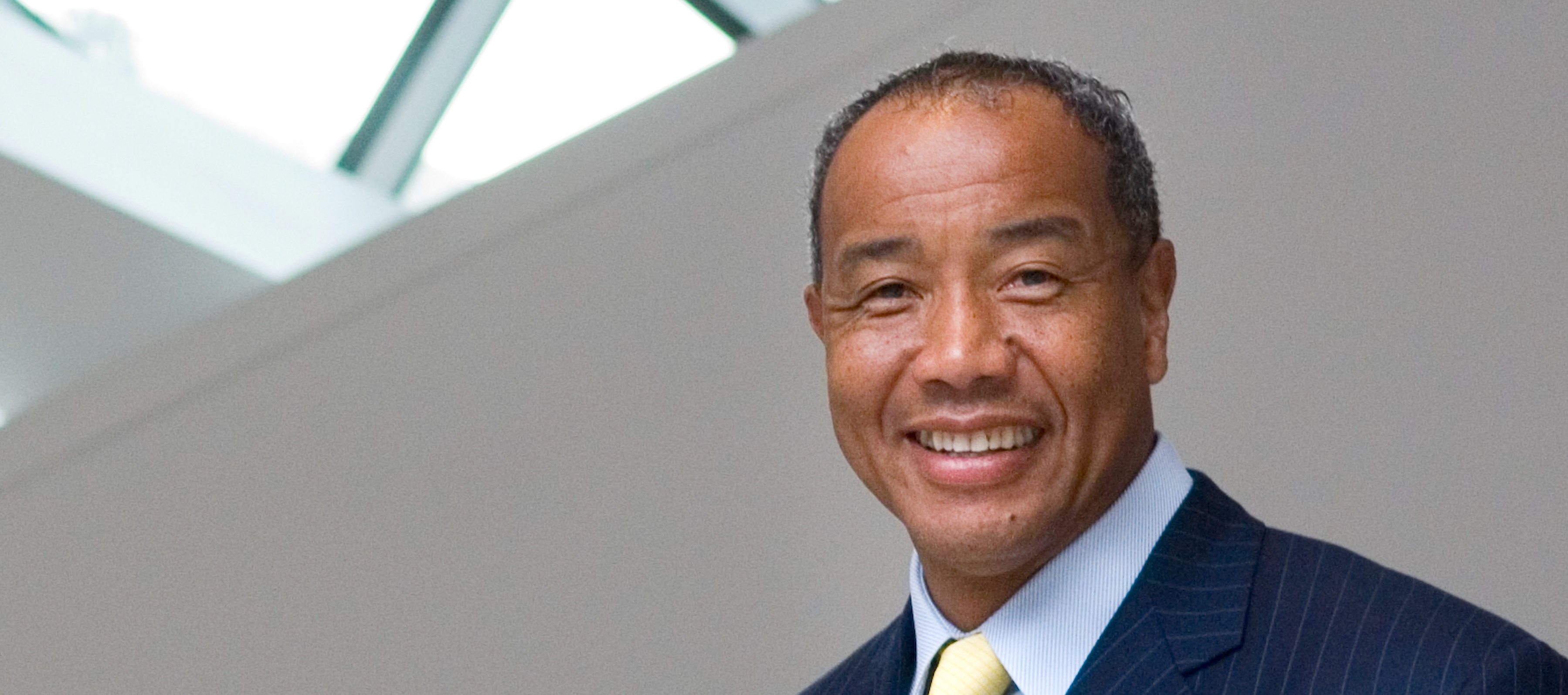 Michael Lee-Chin smiles on the third floor of the Royal Ontario Museum