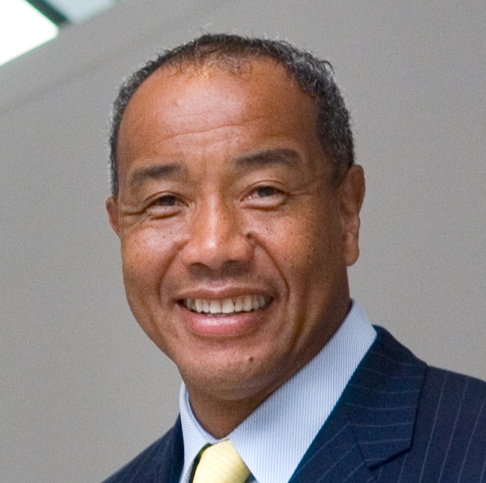 Michael Lee-Chin smiles on the third floor of the Royal Ontario Museum