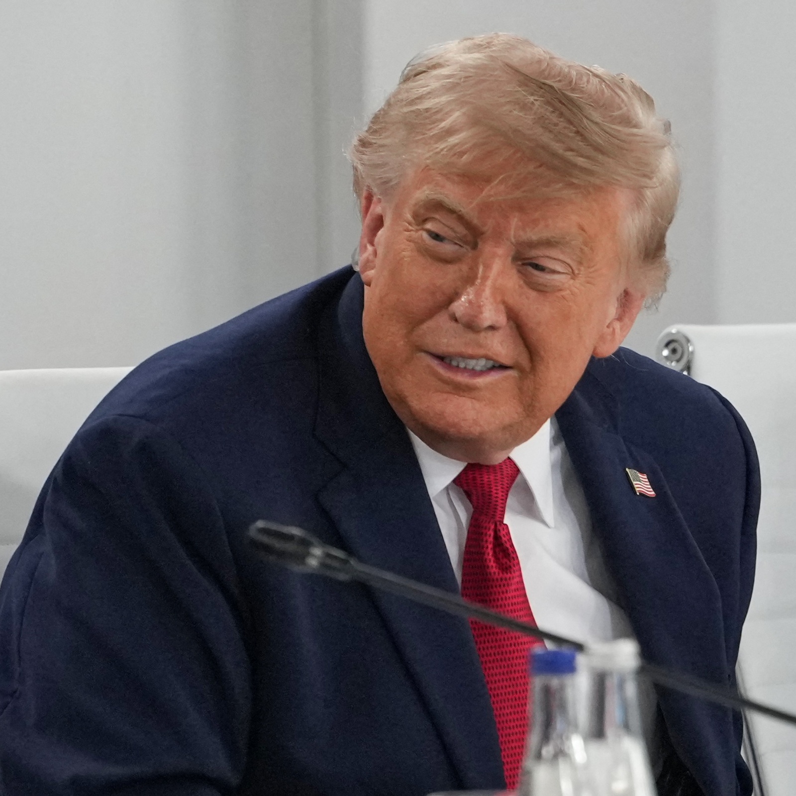 Donald Trump smiles while talking with OpenAI CEO Sam Altman