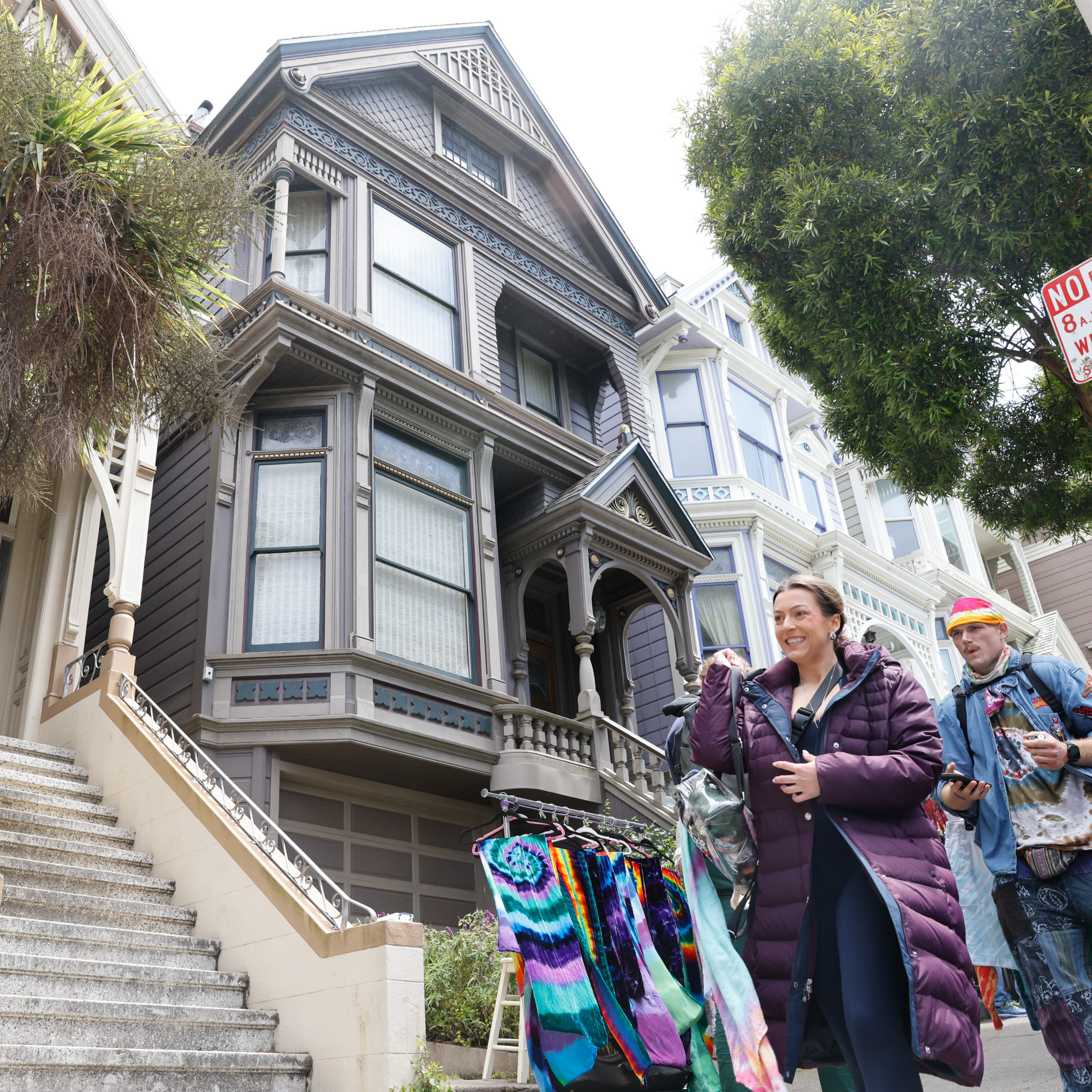 People visit the Grateful Dead house at 710 Ashbury.