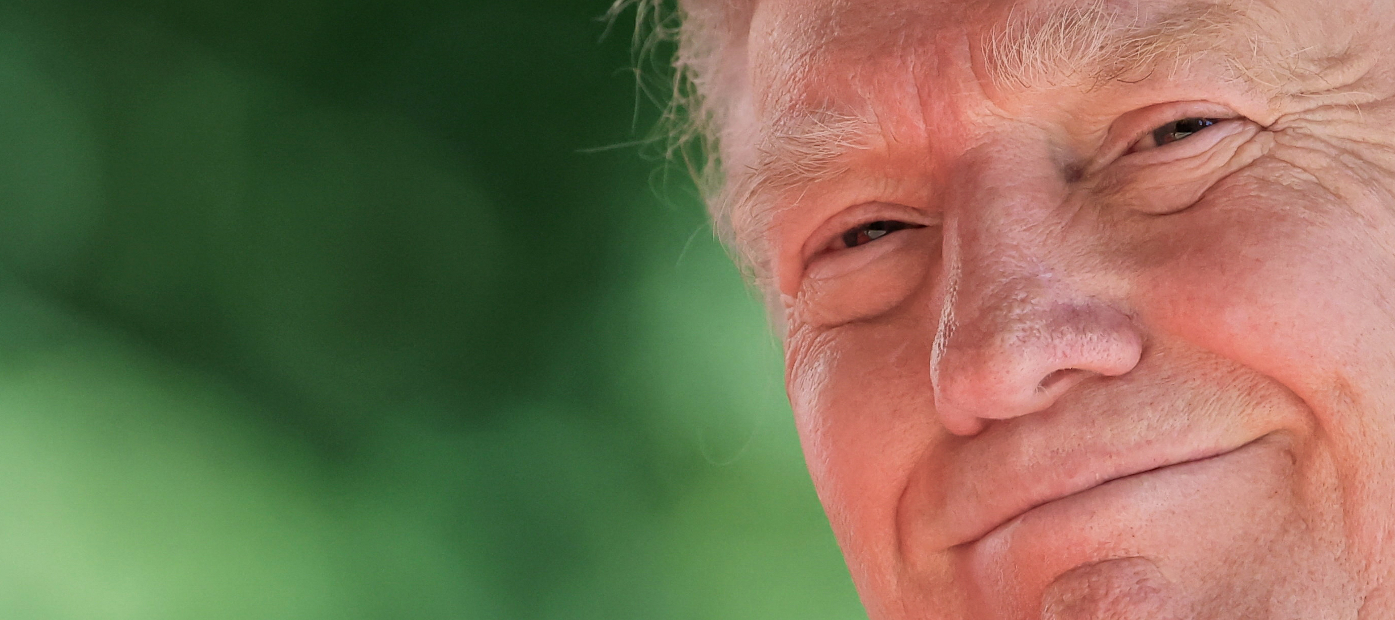 A closeup of U.S. President Donald Trump, smiling.