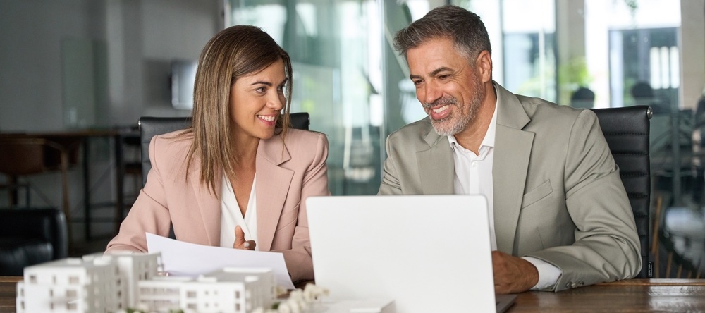 A photo of two real estate investors
