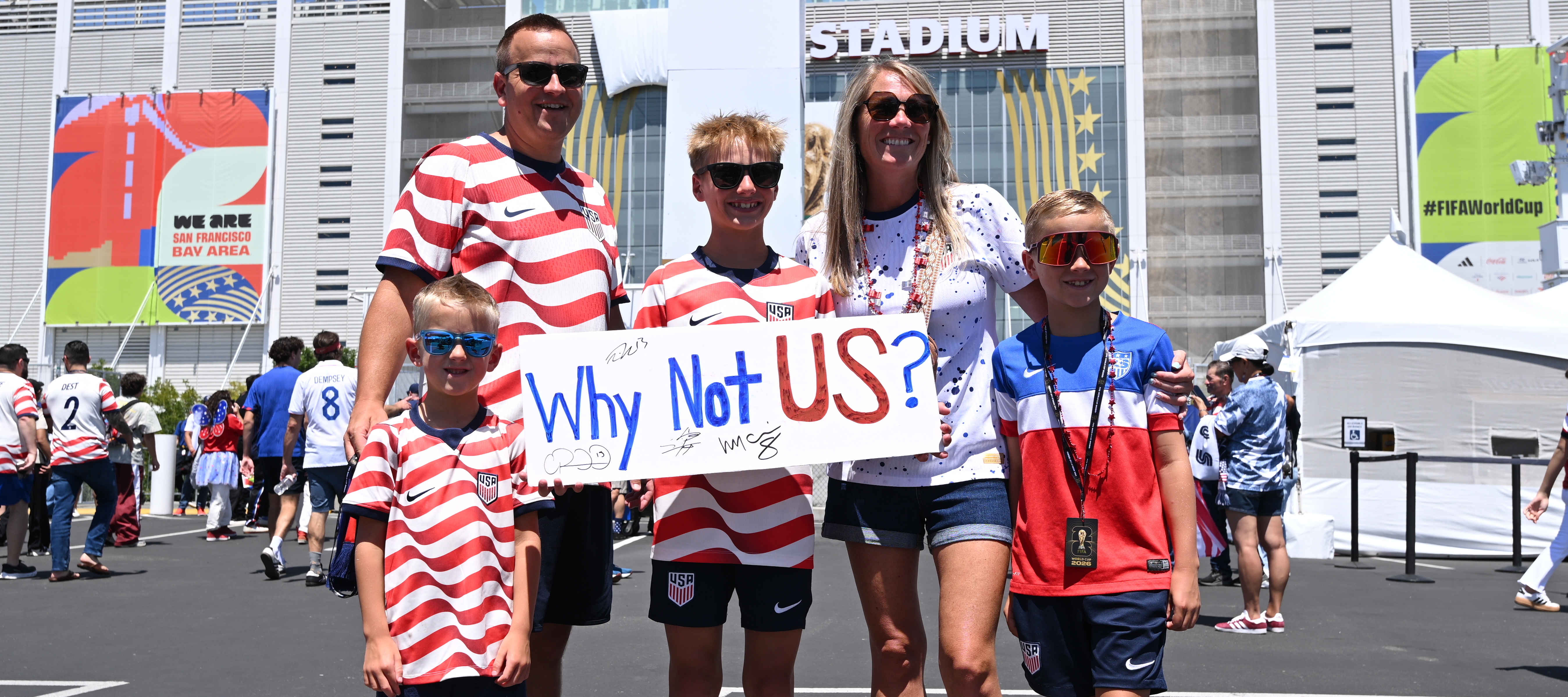 A family of five stands outside of Levi's Stadium in Santa Clara, California.