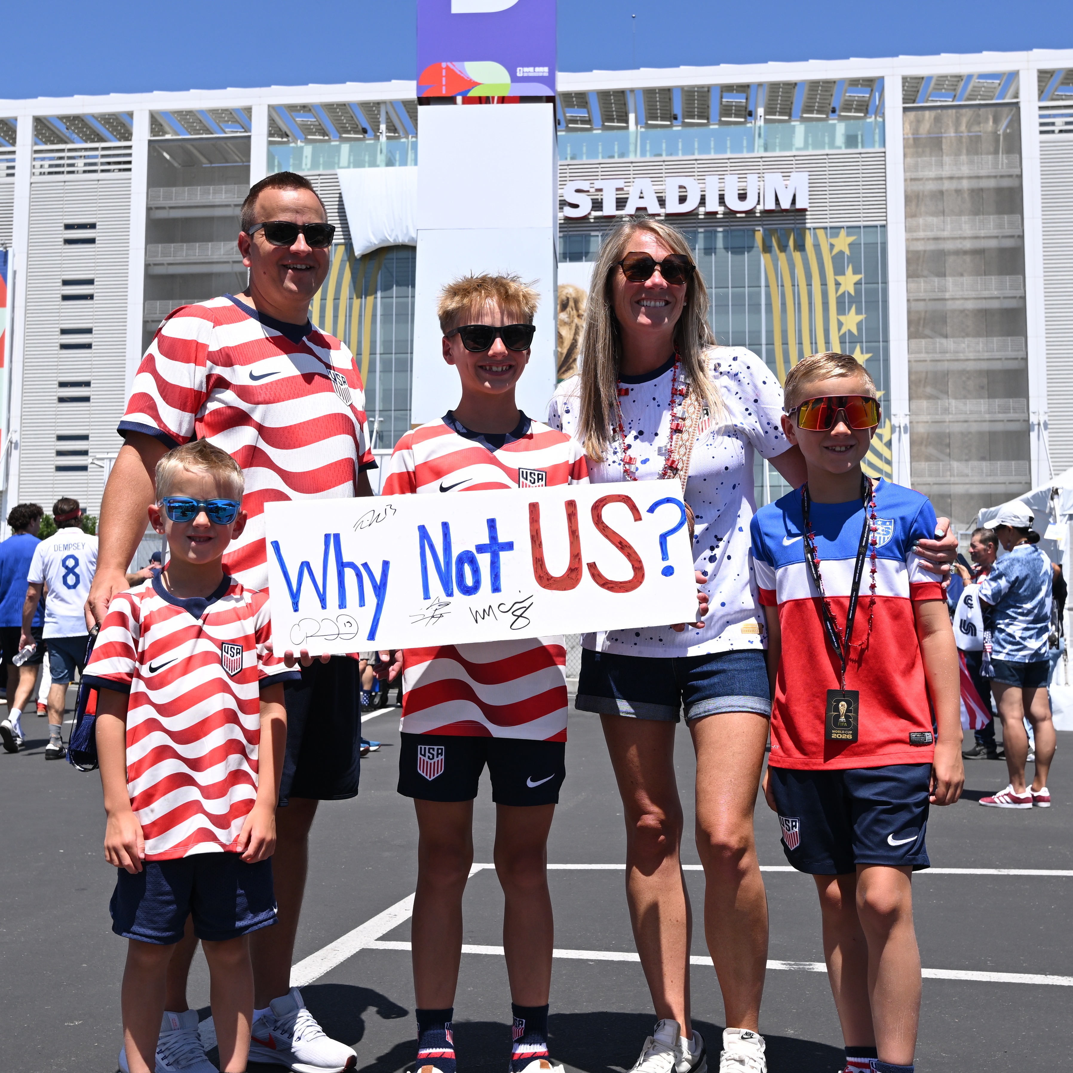 A family of five stands outside of Levi's Stadium in Santa Clara, California.