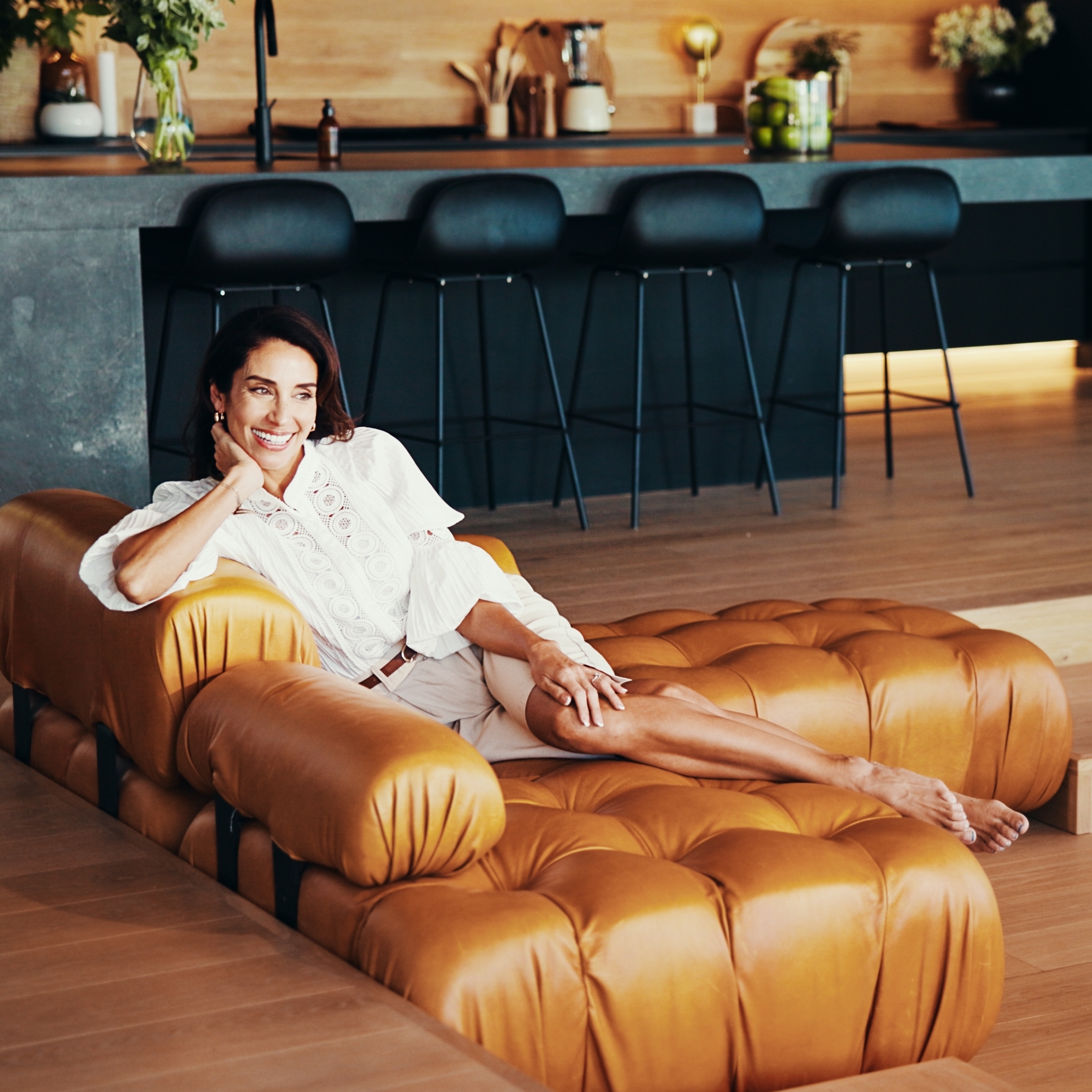 Woman smiling in luxury home.