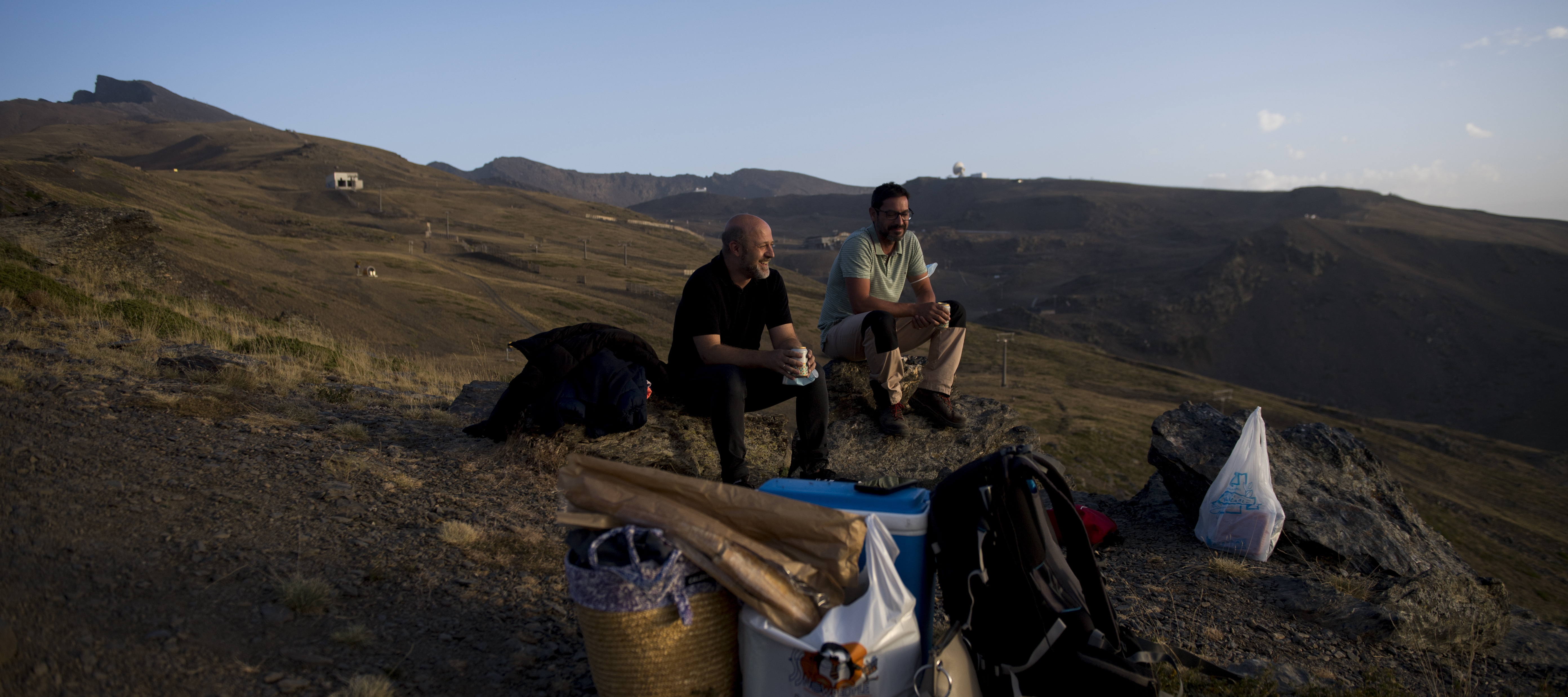 Two people wait for the sunset to see the Perseid meteor shower on in Sierra Nevada, Spain.