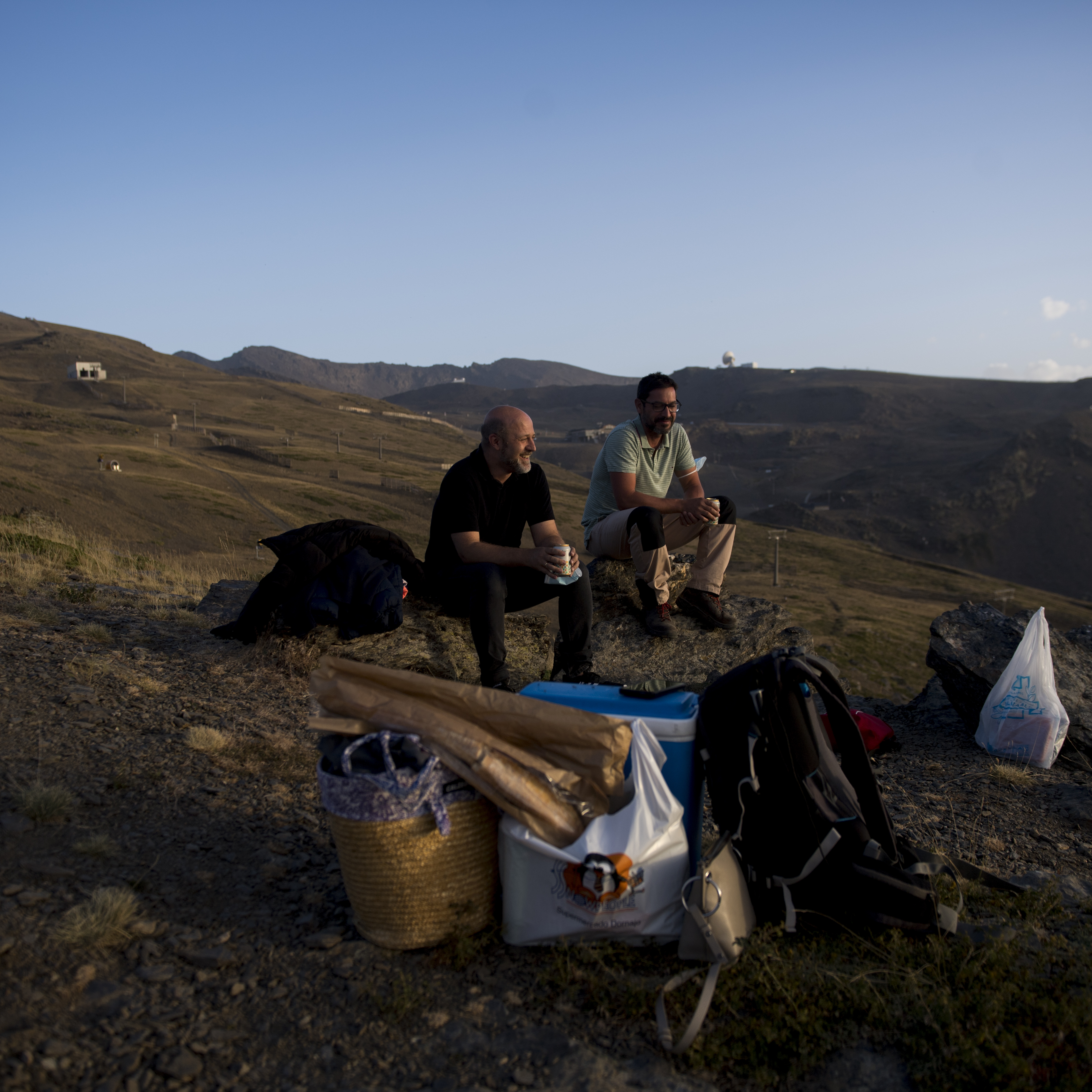 Two people wait for the sunset to see the Perseid meteor shower on in Sierra Nevada, Spain.