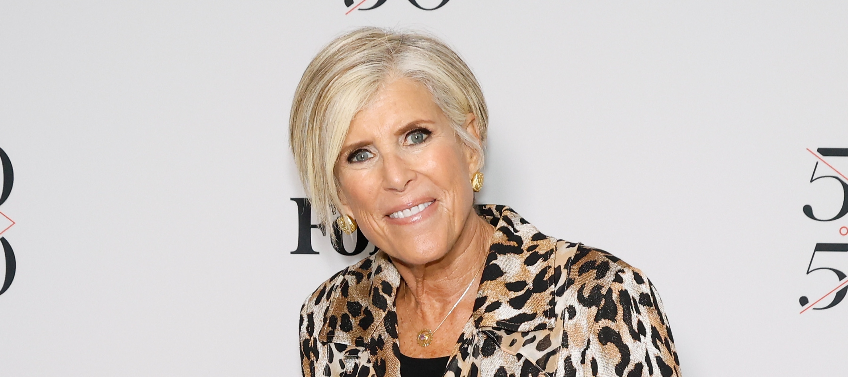 Suze Orman smiles at the camera.