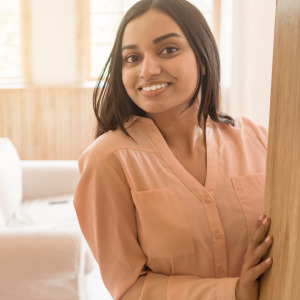 A woman in her apartment.