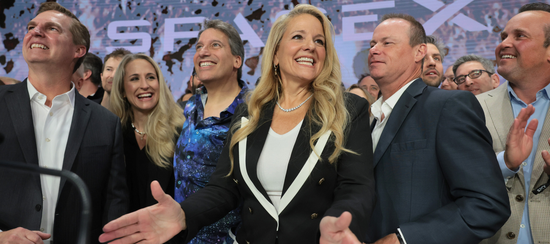 Gwynne Shotwell, President of SpaceX, is joined by company leadership as they ring the opening bell at the Nasdaq.