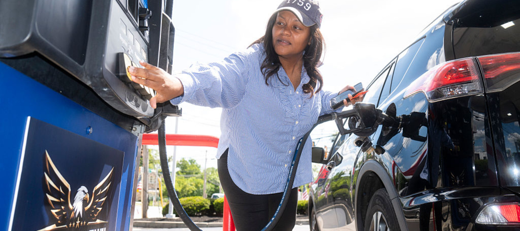 Photo of a customer filling up at a Freedom Fuel station