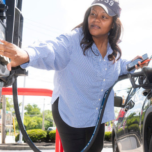Photo of a customer filling up at a Freedom Fuel station