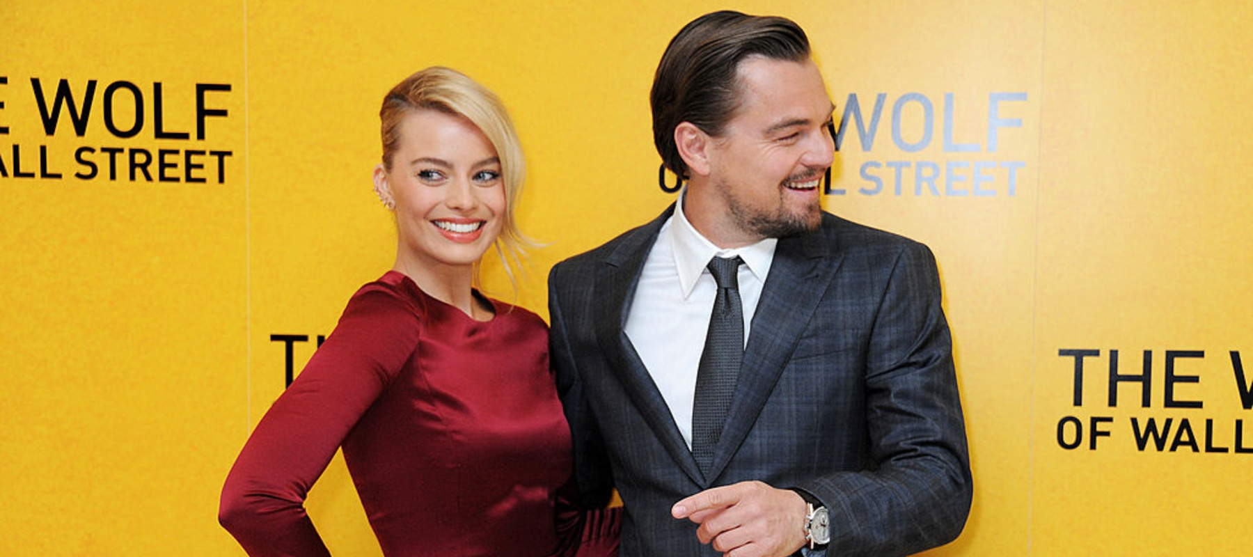 Margot Robbie (L) and Leonardo DiCaprio attend the UK Premiere of "The Wolf Of Wall Street."