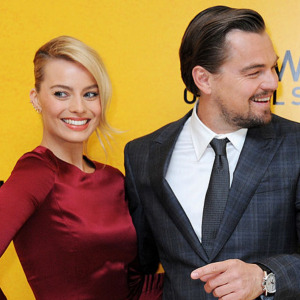 Margot Robbie (L) and Leonardo DiCaprio attend the UK Premiere of "The Wolf Of Wall Street."