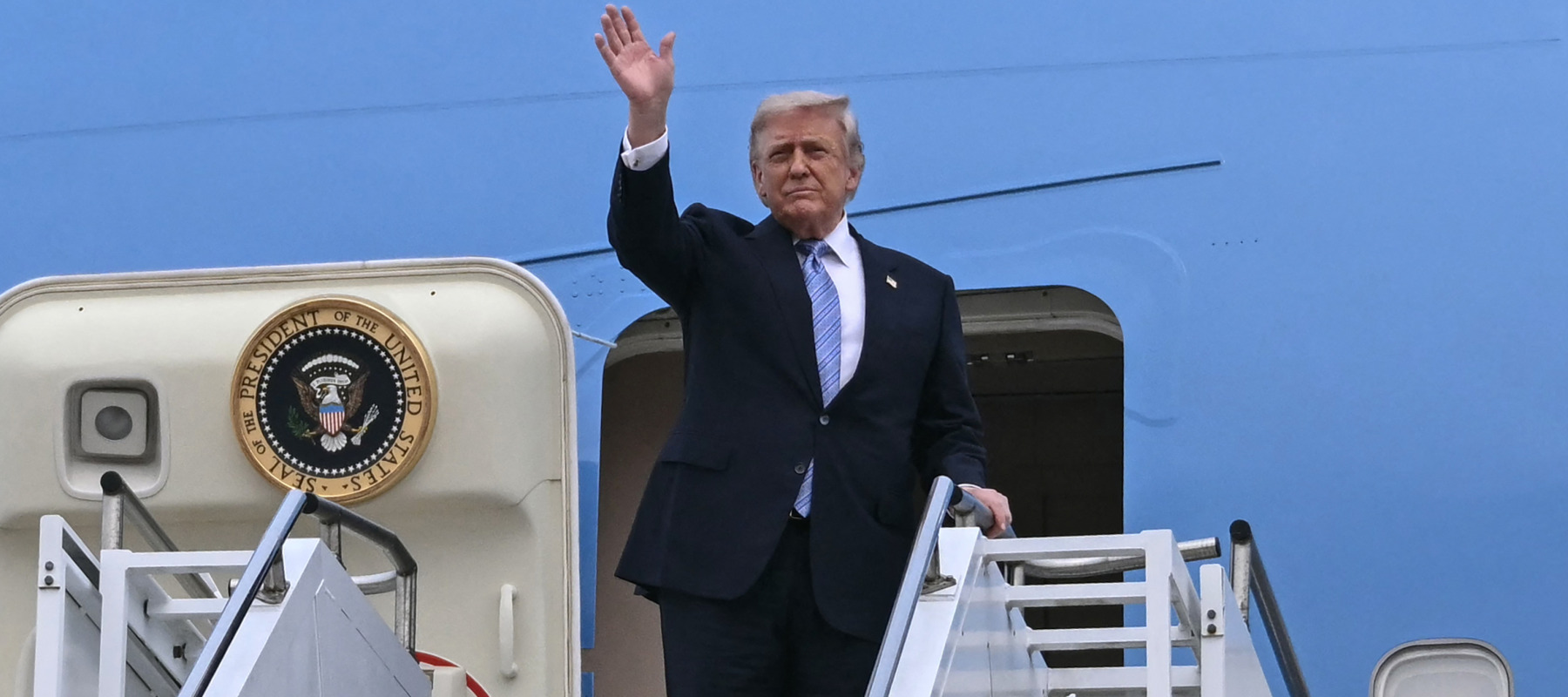 President Trump boards Air Force One.