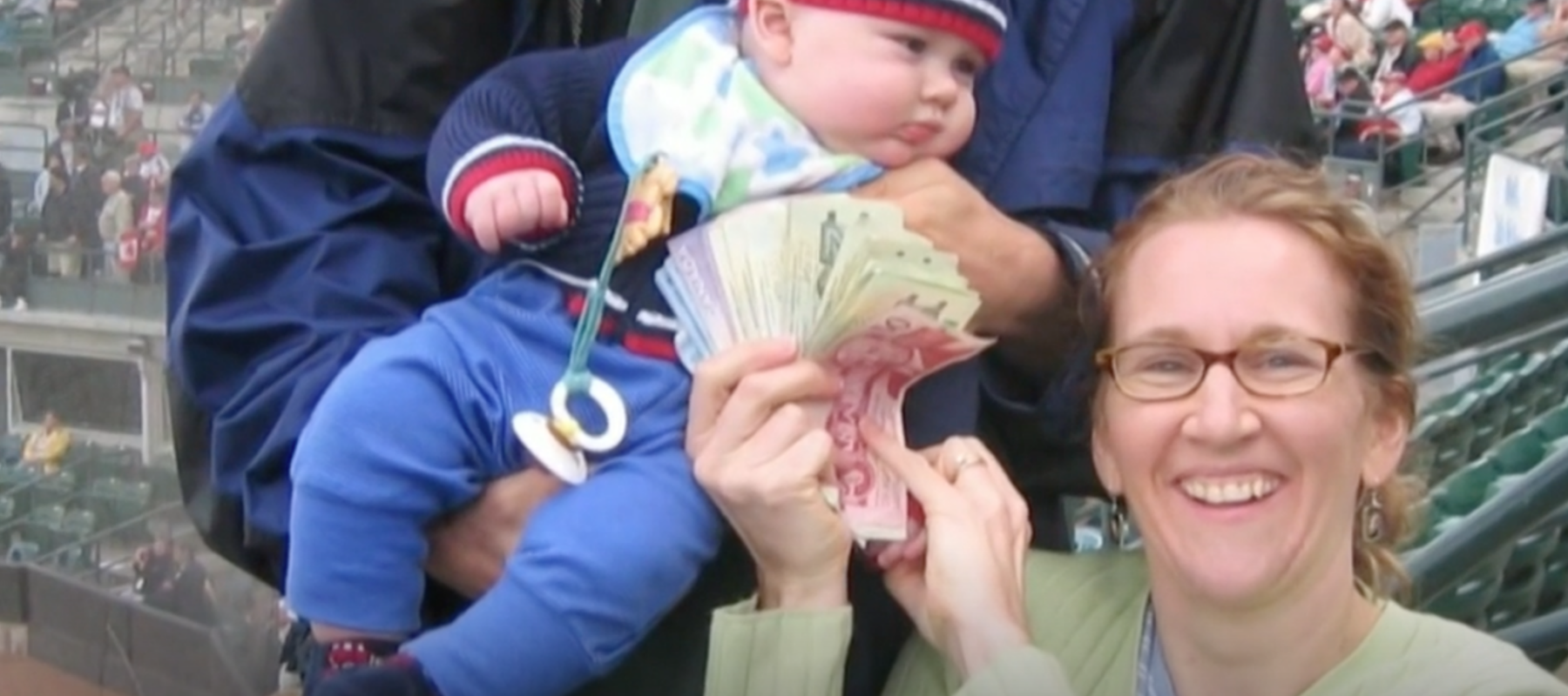 Leo Bruce and his parents at a baseball game in 2004.