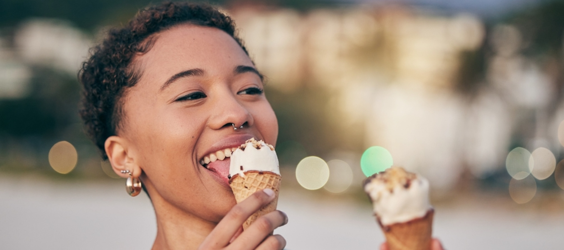 A photo of a woman eating ice cream