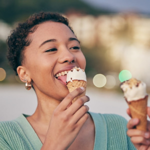 A photo of a woman eating ice cream
