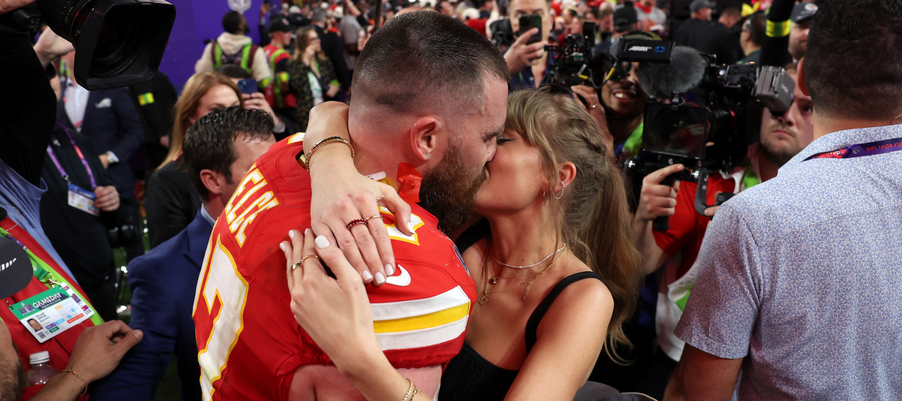 ravis Kelce of the Kansas City Chiefs celebrates and kisses Taylor Swift following the NFL Super Bowl 58 football game between the San Francisco 49ers and the Kansas City Chiefs.